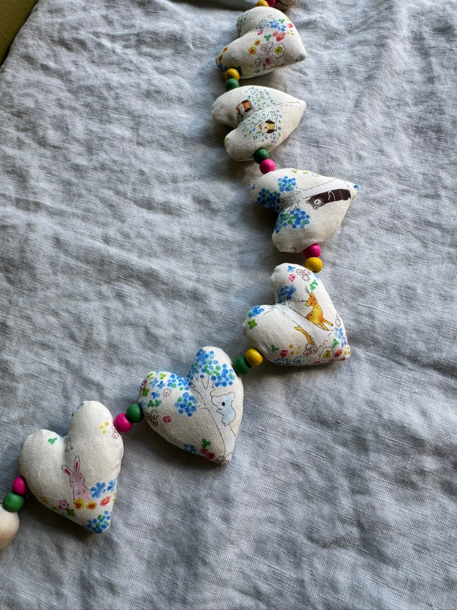 Handmade 'strings of love' heart garland - animals