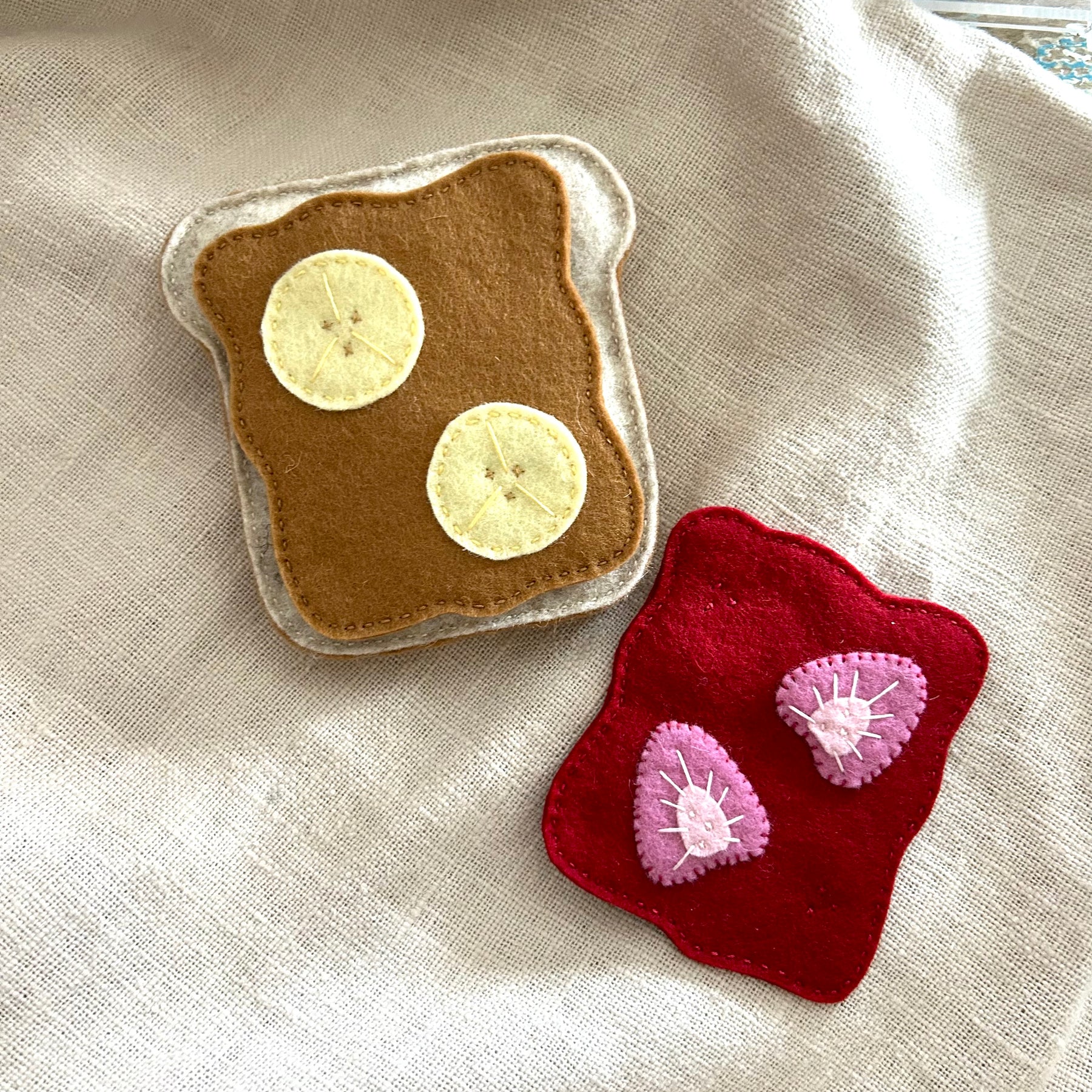 Toast with peanut butter or jam, strawberry jelly, play kitchen