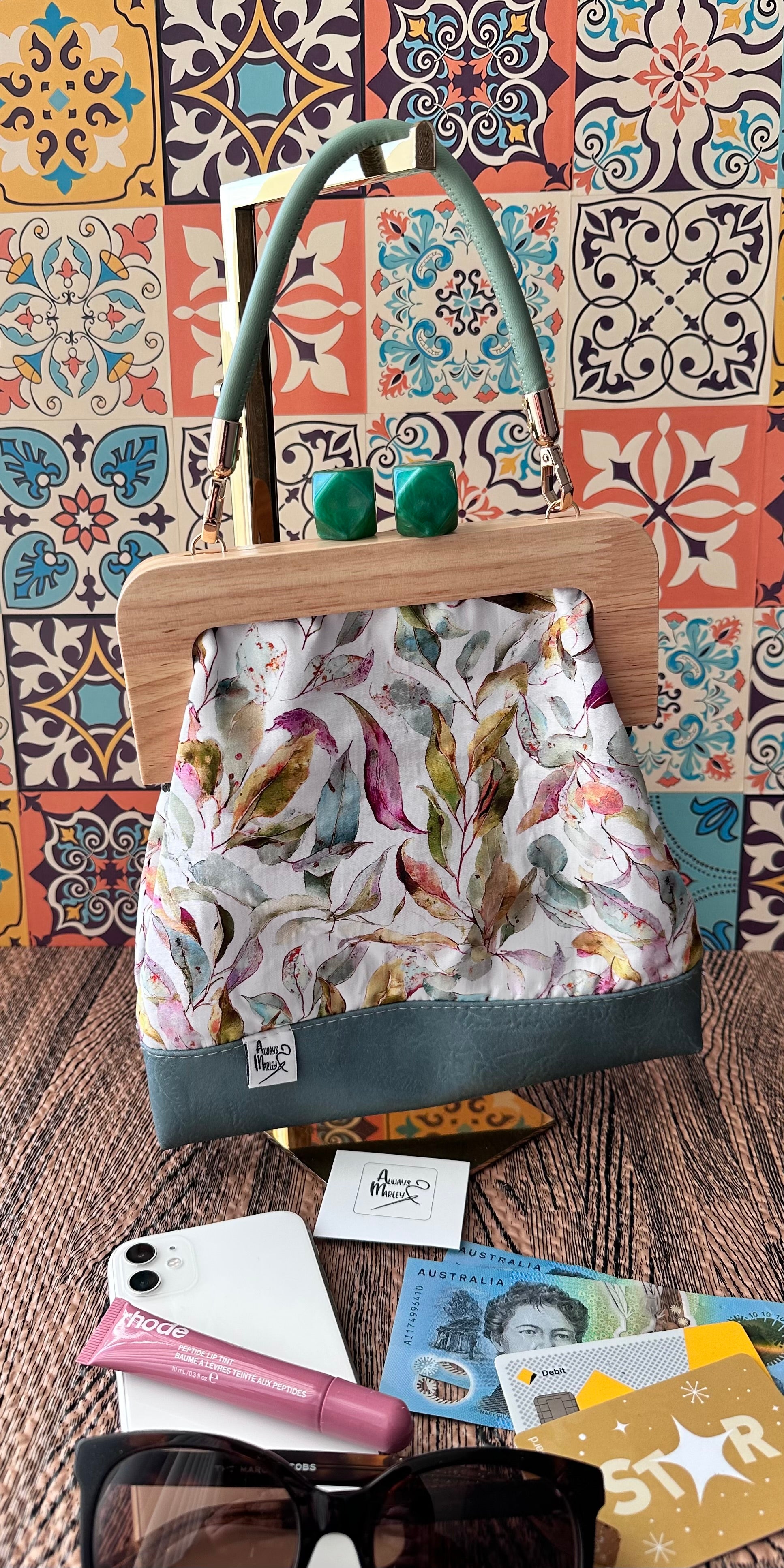 Kiss Lock Clutch with Vinyl Handle