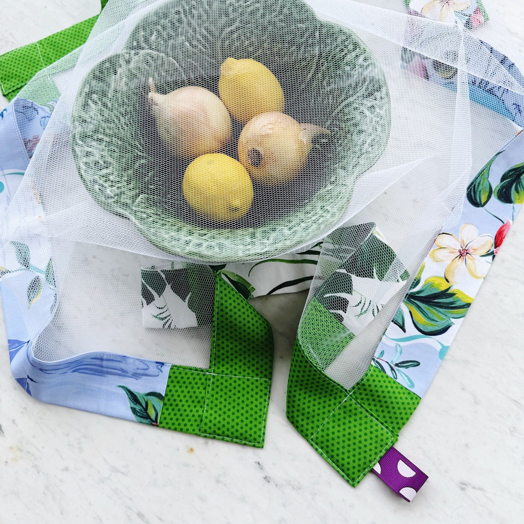 Tropical style weighted mesh food cover.