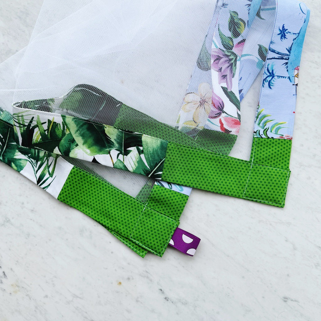 Tropical style weighted mesh food cover.