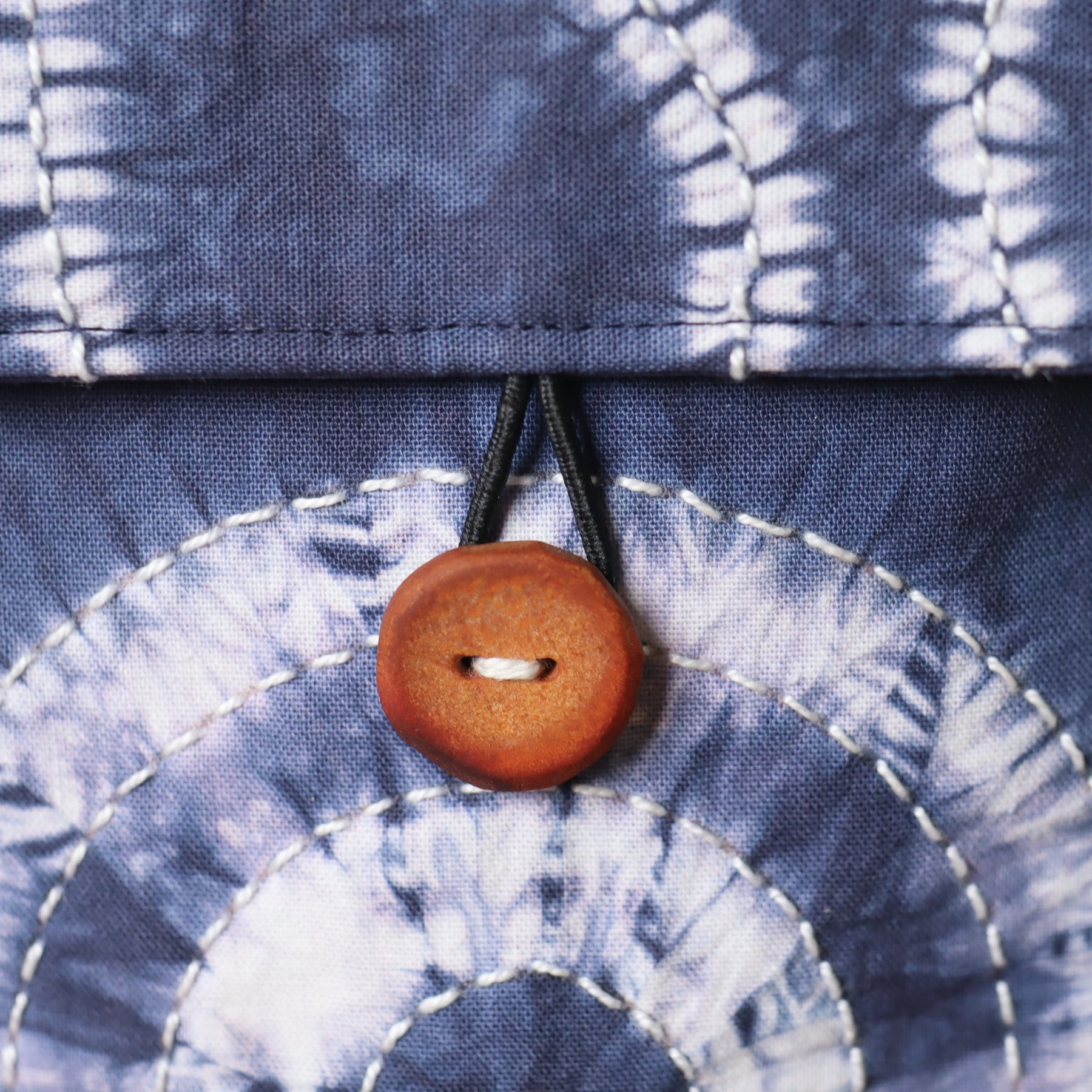 Hand carved Avocado pit Buttons, set of 10 with hand dyed pouch.