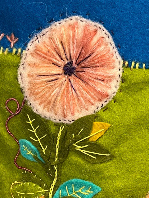 Handmade and hand embroidered cushion