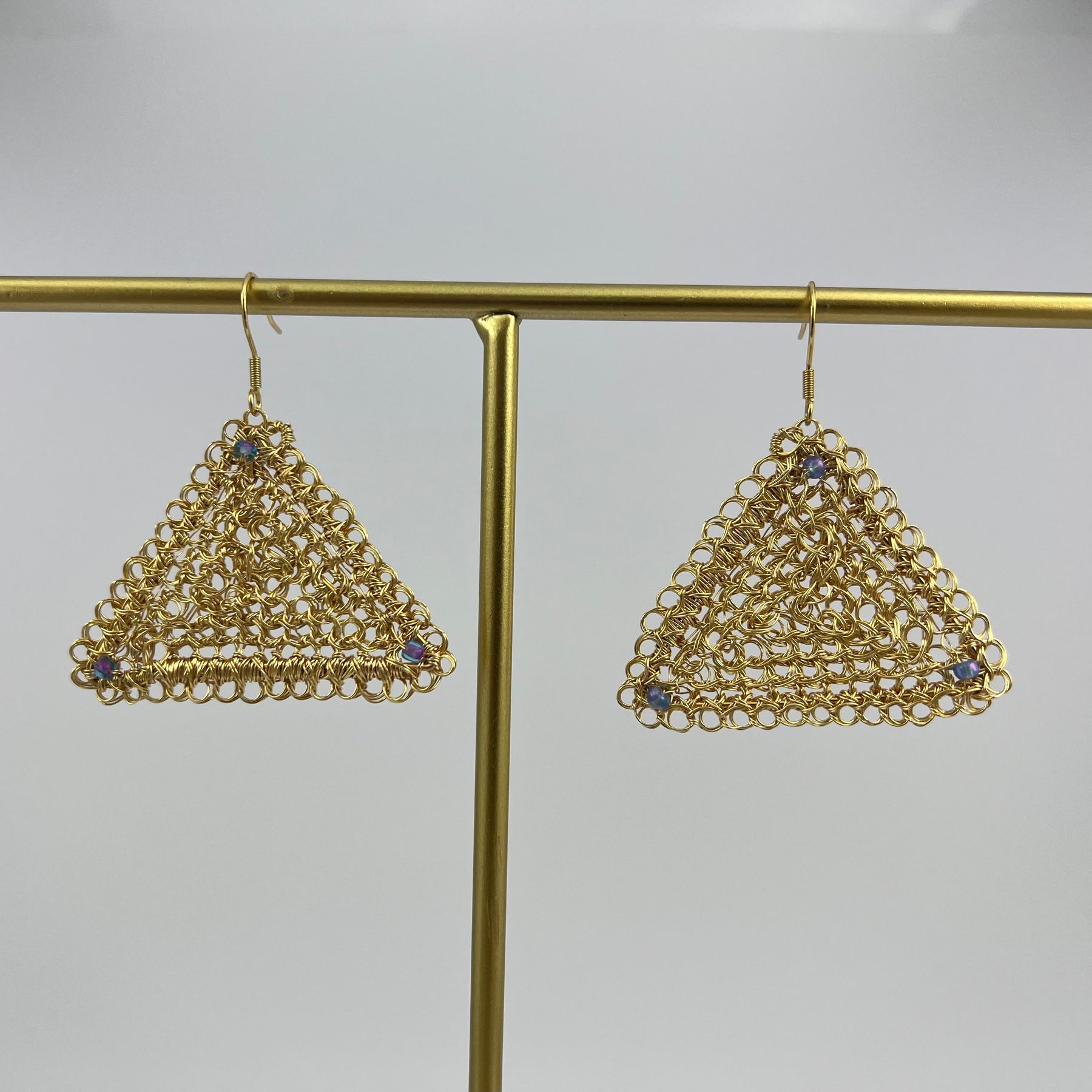 Gold triangle earrings, Peruvian