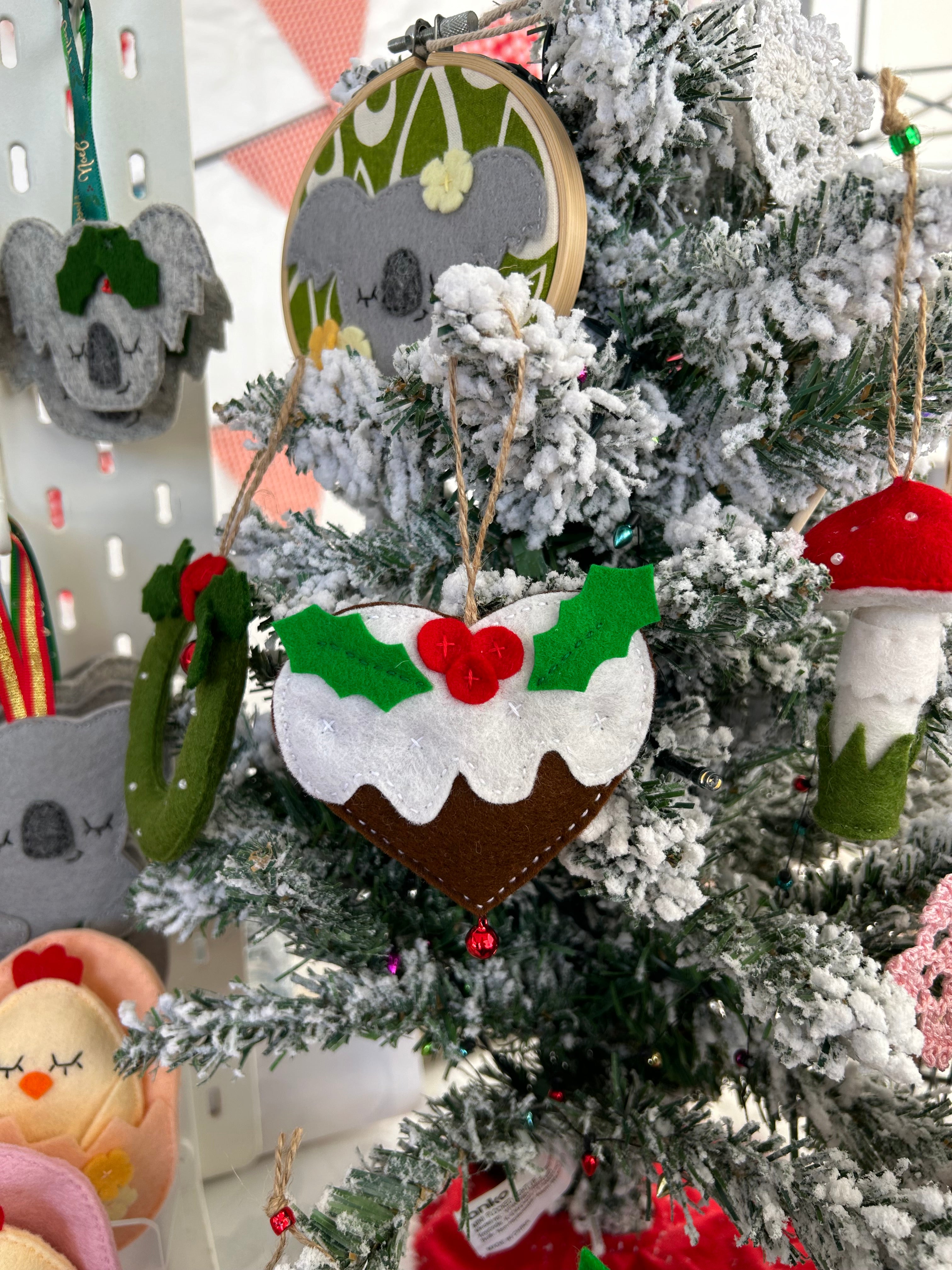 Christmas pudding heart decoration with a bell
