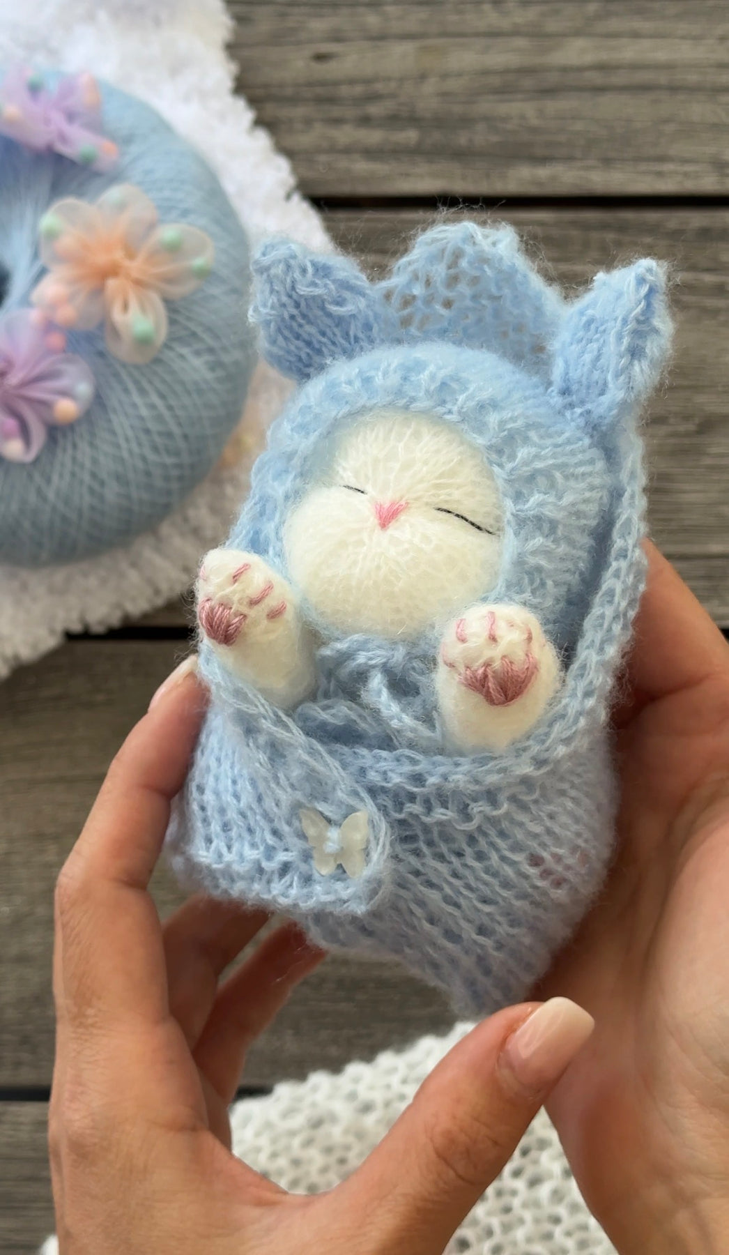 Handmade White Knitted Sleeping Kitten in Blue Bunny Bonnet and Blanket with Butterfly Toy