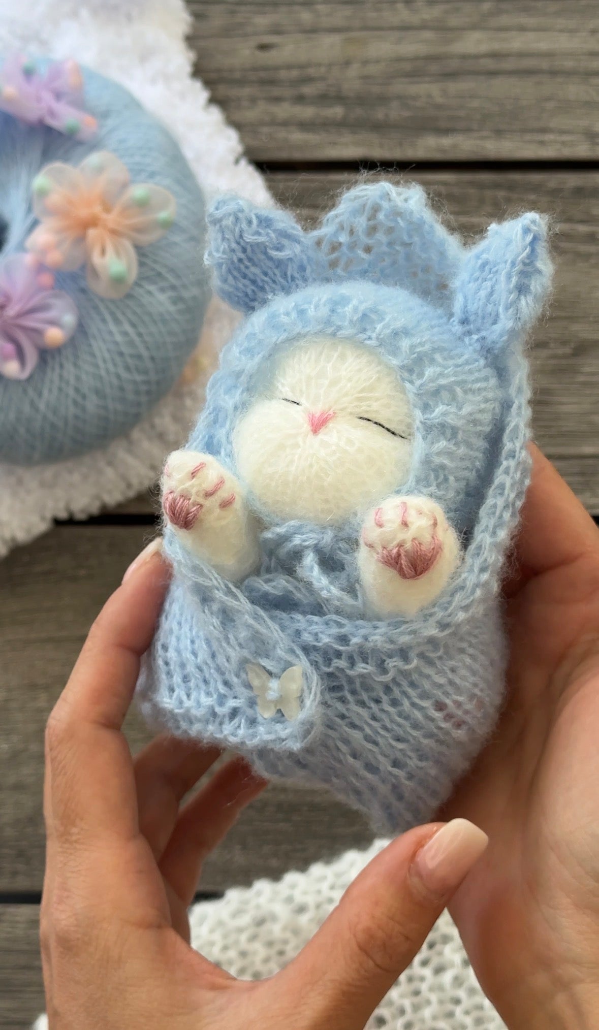 Handmade White Knitted Sleeping Kitten in Blue Bunny Bonnet and Blanket with Butterfly Toy