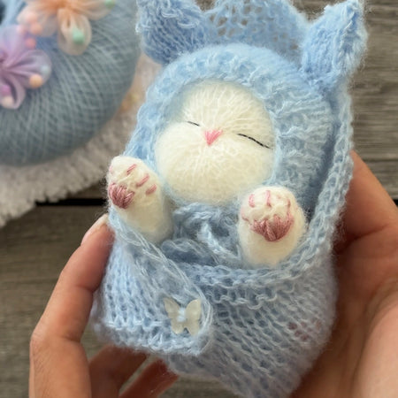 Handmade White Knitted Sleeping Kitten in Blue Bunny Bonnet and Blanket with Butterfly Toy