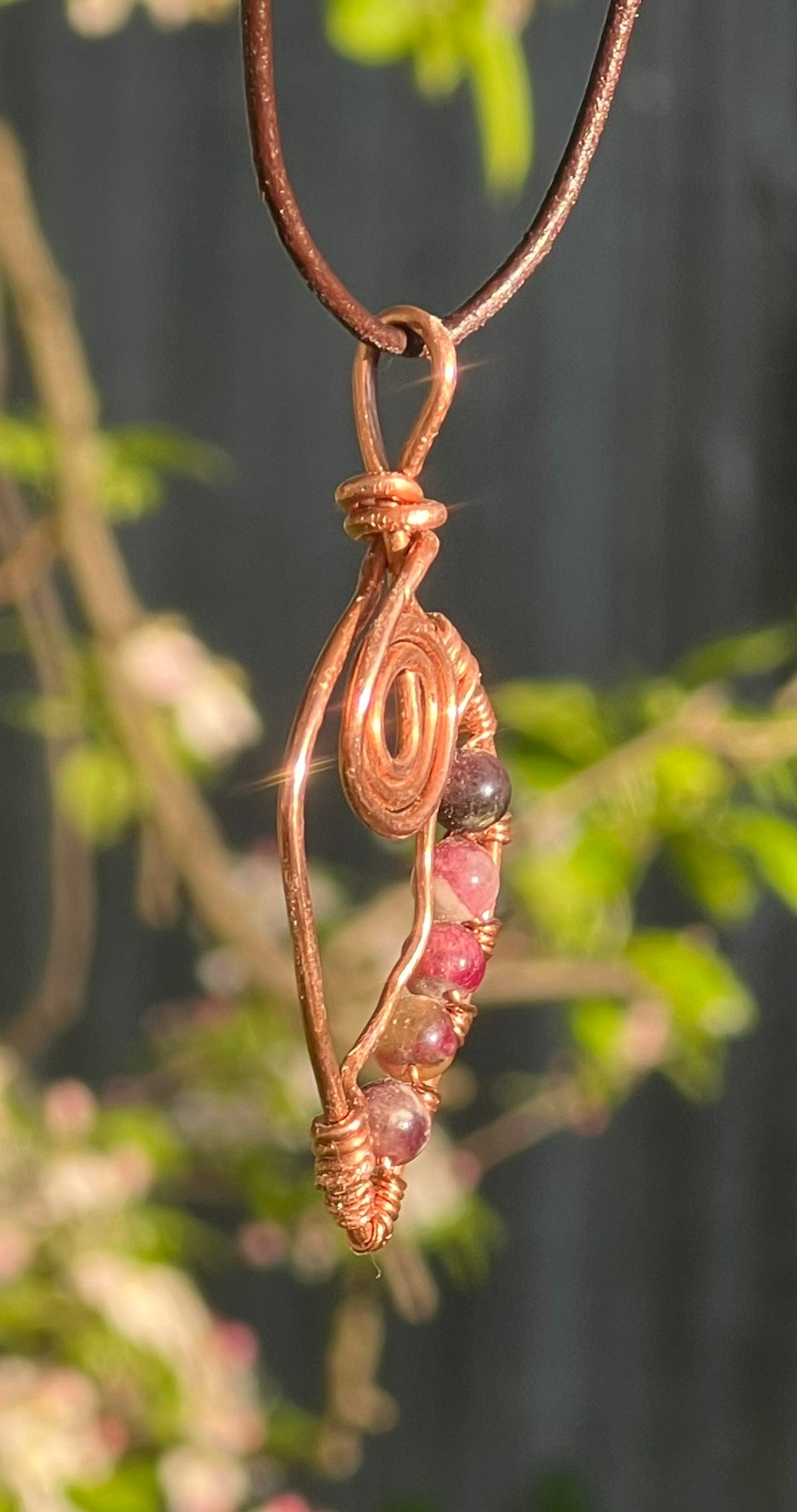 Unique Copper Spiral Gemstone Pendant with brown cord