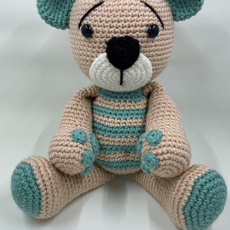 Handmade crochet teddy bear