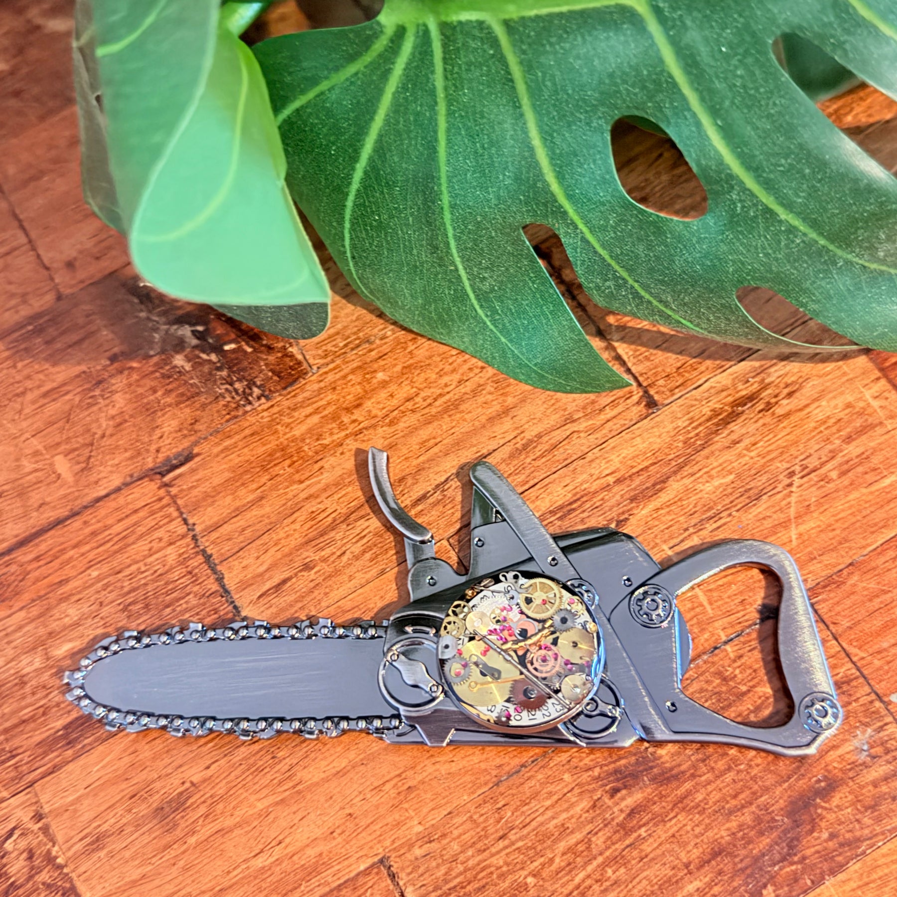 Steampunk watch parts  bottle opener (Chain Saw)