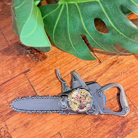 Steampunk watch parts  bottle opener (Chain Saw)
