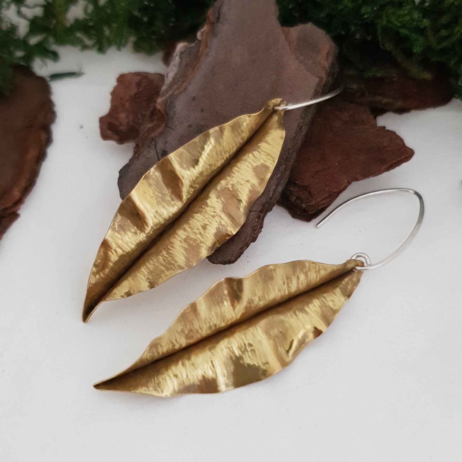 Golden brass leaf earrings