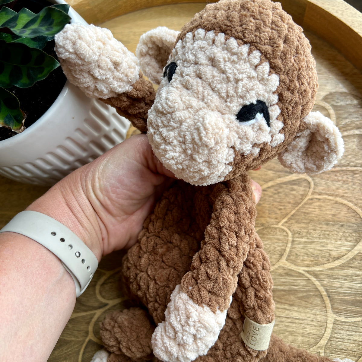 Handmade modern crochet toy monkey lovey snuggler.