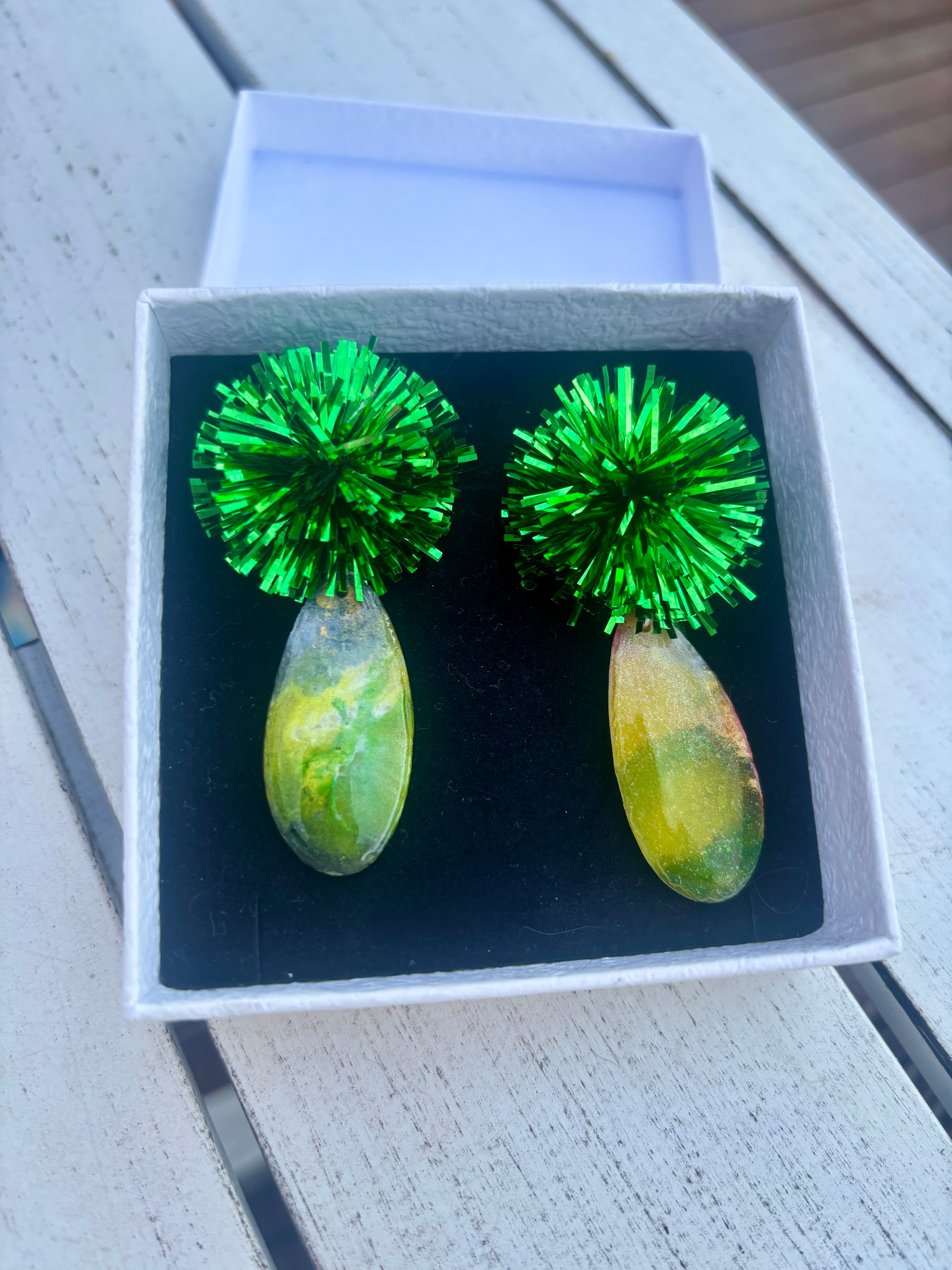 Emerald Pom Pom Statement Earrings