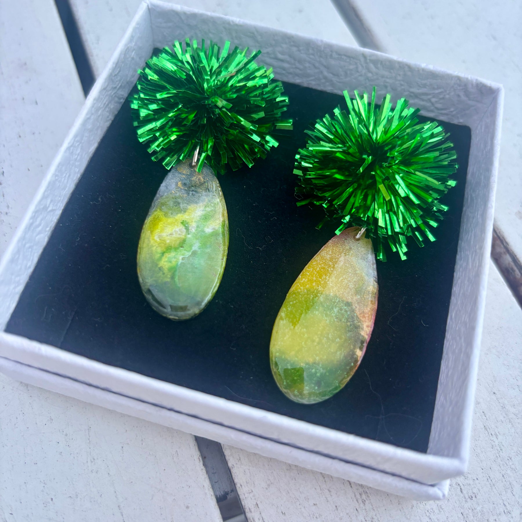 Emerald Pom Pom Statement Earrings