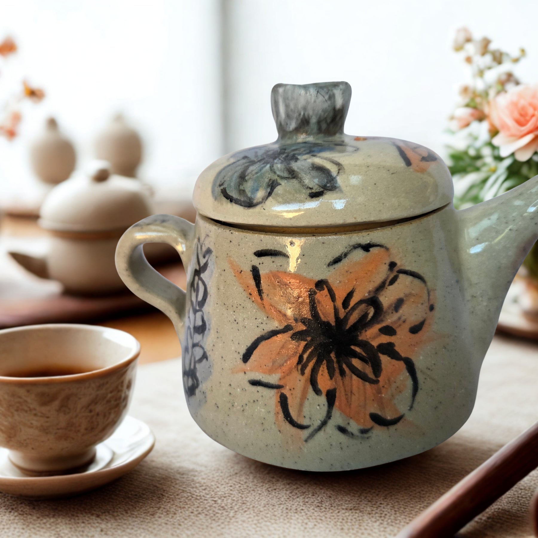 Small Japanese inspired ceramic One cup tea pot. Hand painted floral design. 10 x 9.5cm