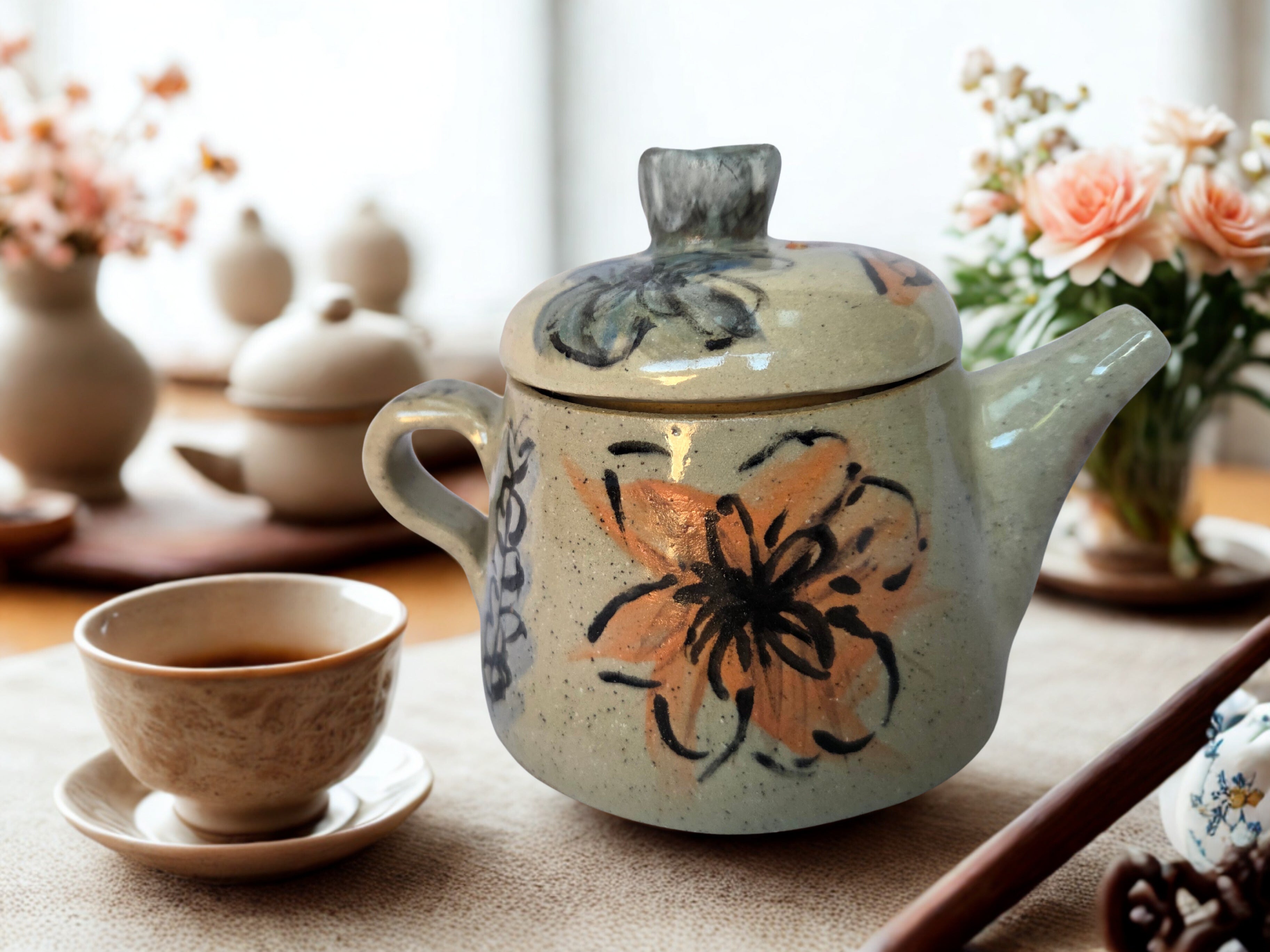 Small Japanese inspired ceramic One cup tea pot. Hand painted floral design. 10 x 9.5cm