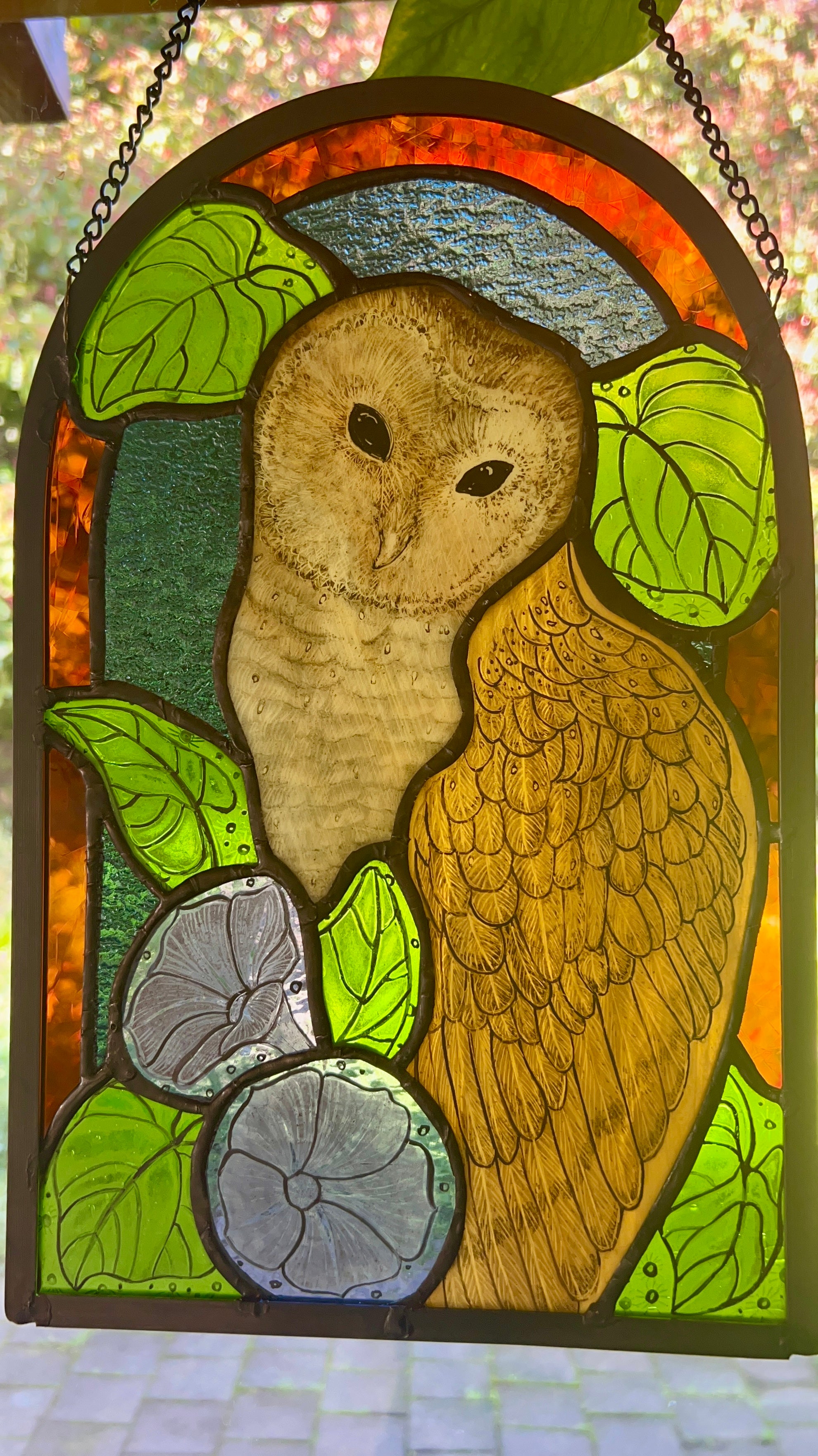 Stained glass owl panel.