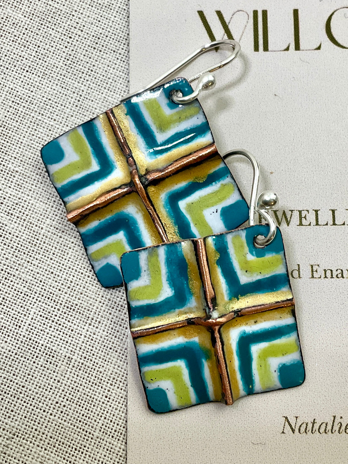 White, gold, teal and green fold form enamel earrings. Handmade