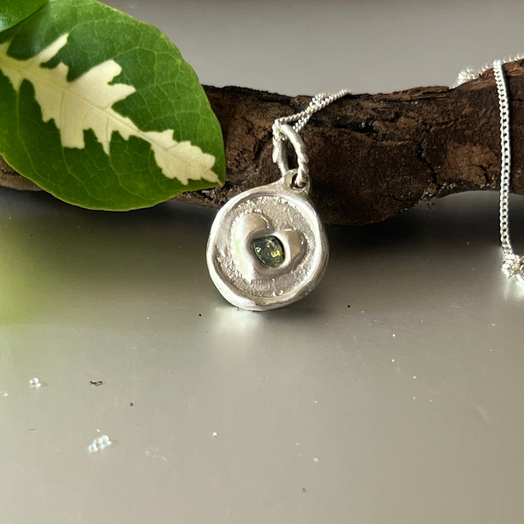 "My Heart" - Sterling Silver Pendant with Pale Green Sapphire set in a heart. Includes Sterling Silver Chain