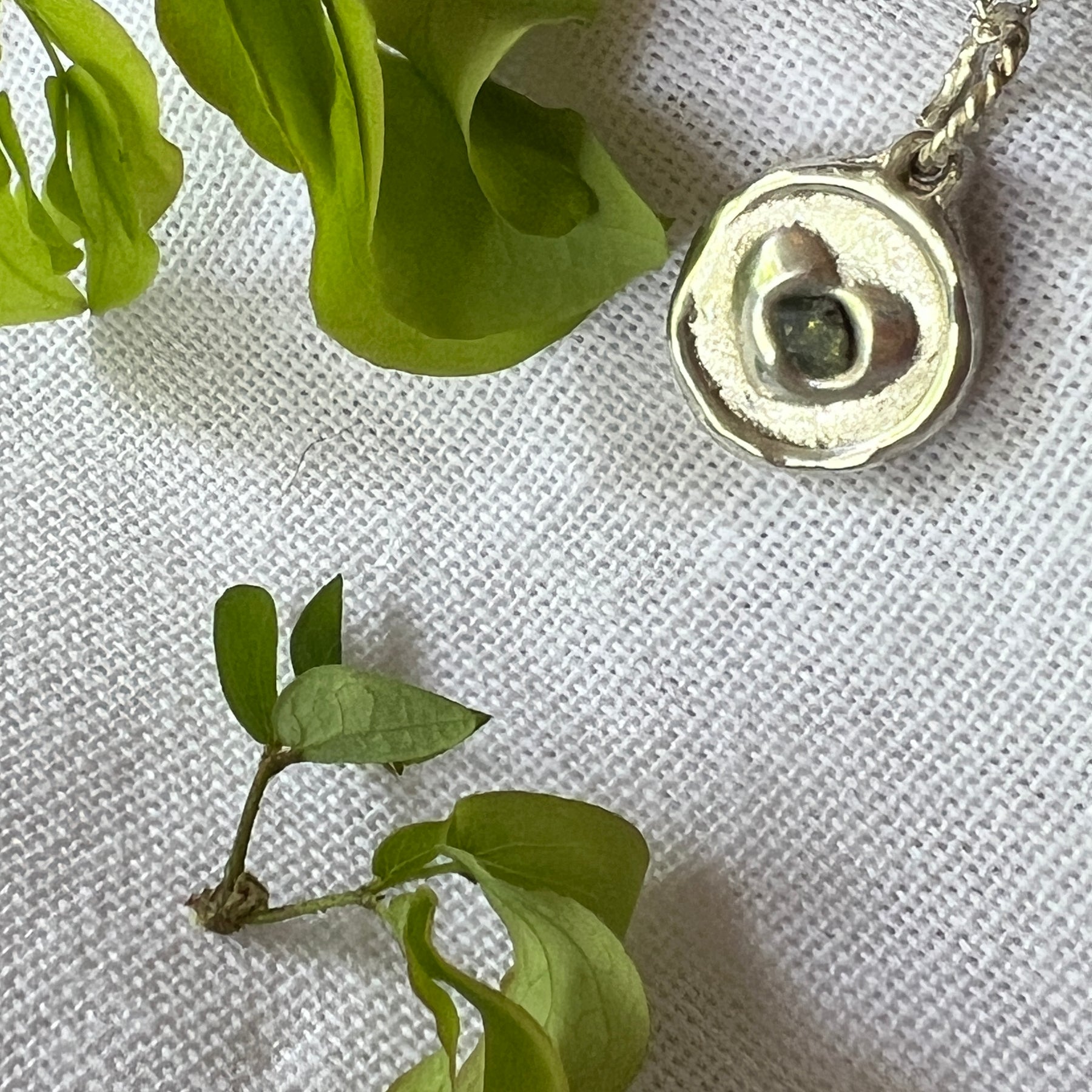 "My Heart" - Sterling Silver Pendant with Pale Green Sapphire set in a heart. Includes Sterling Silver Chain