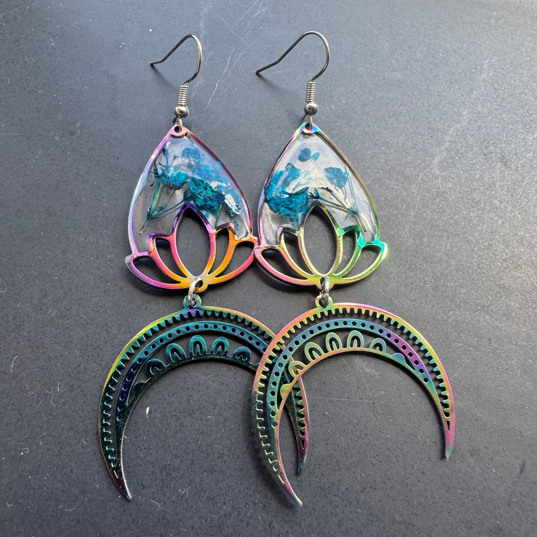 Iridescent rainbow resin earrings with pressed flowers