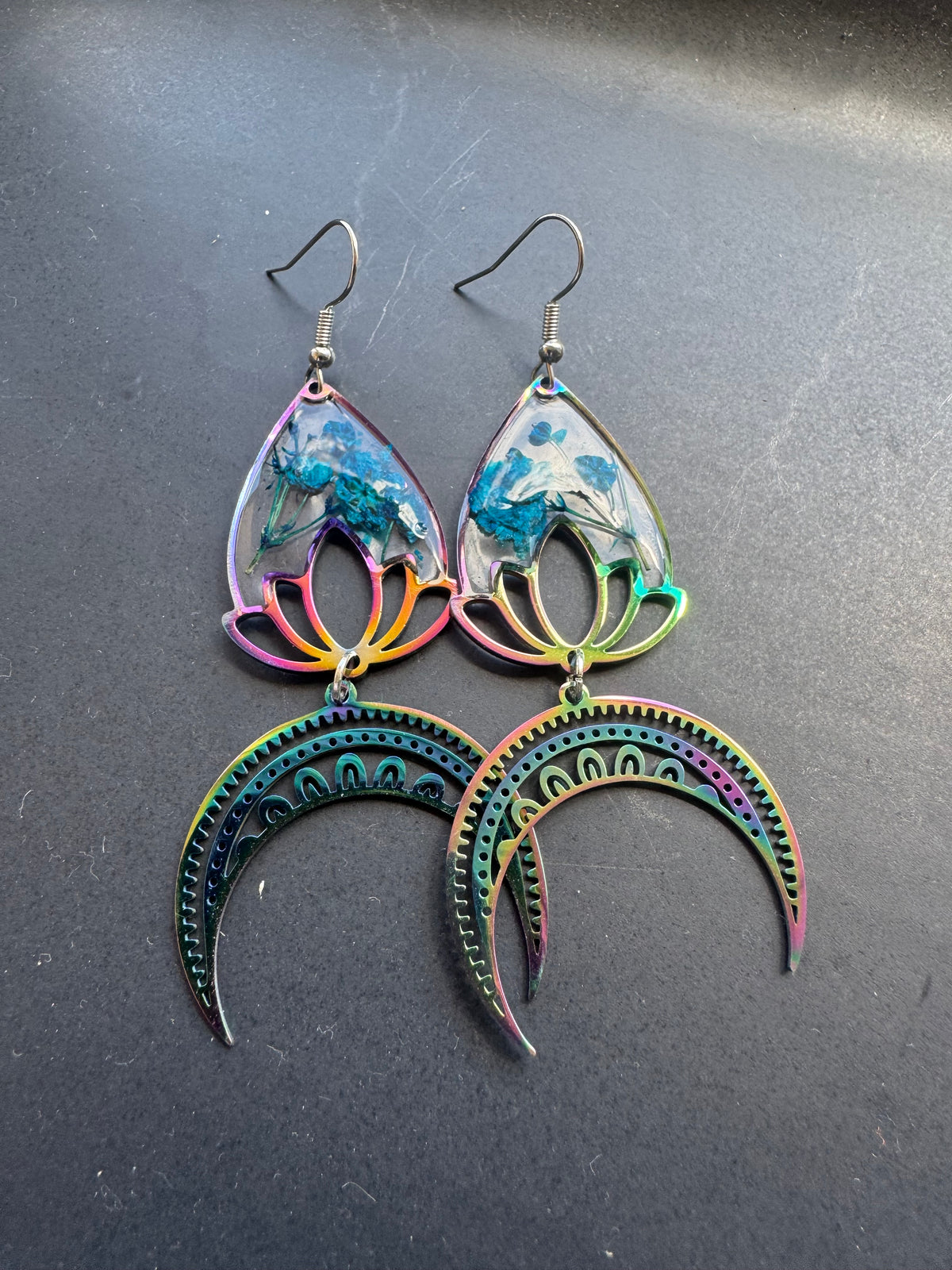 Iridescent rainbow resin earrings with pressed flowers