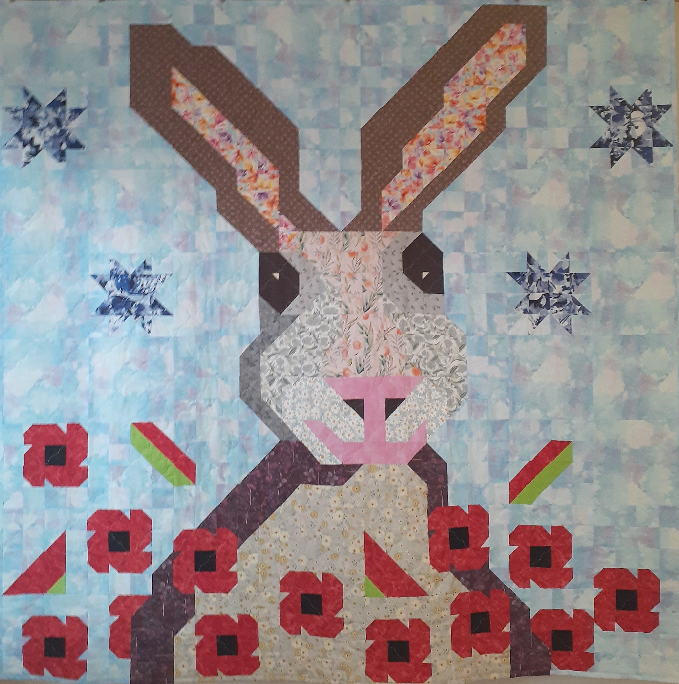 Harry the hare in the poppy field patchwork quilt