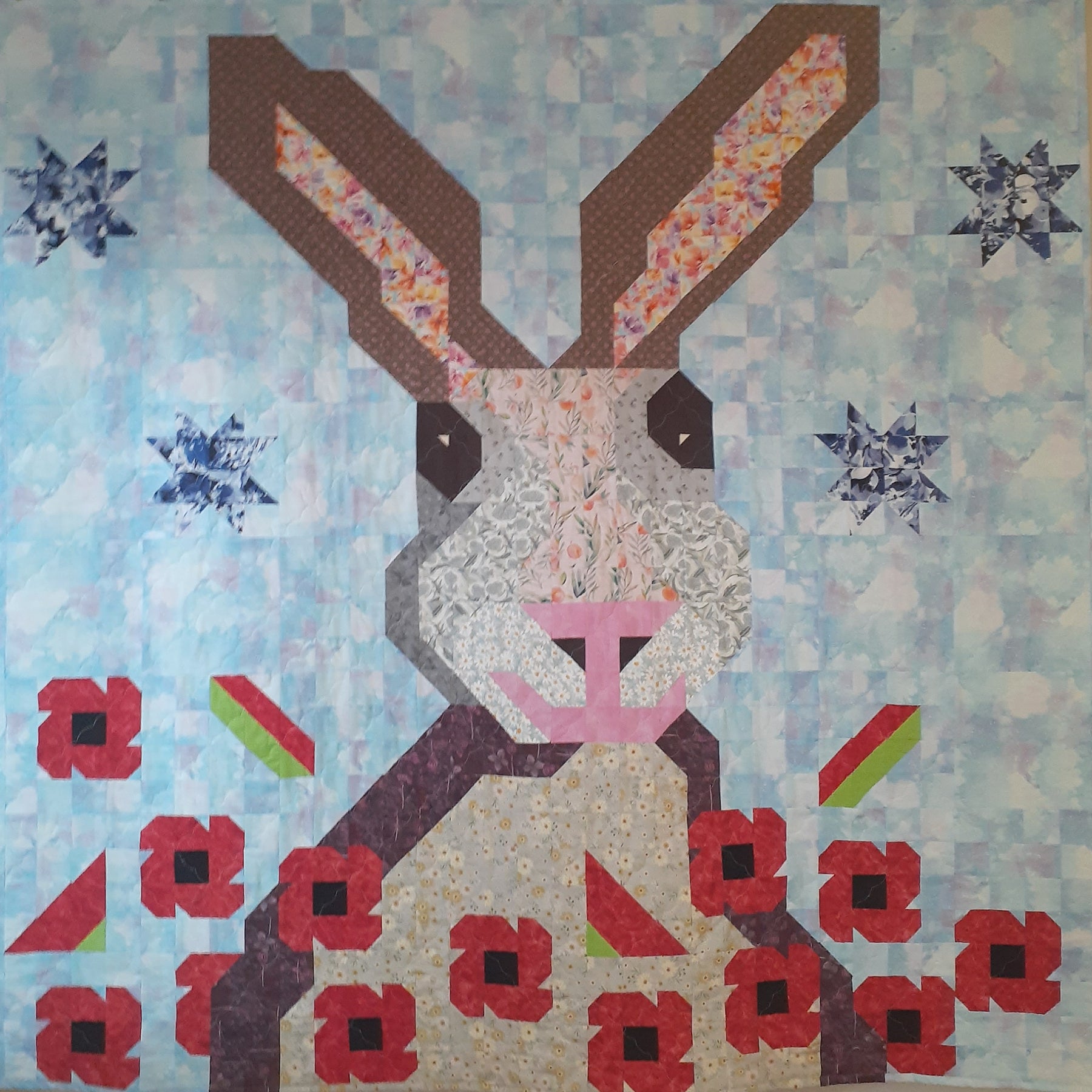 Harry the hare in the poppy field patchwork quilt