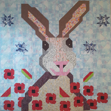Harry the hare in the poppy field patchwork quilt