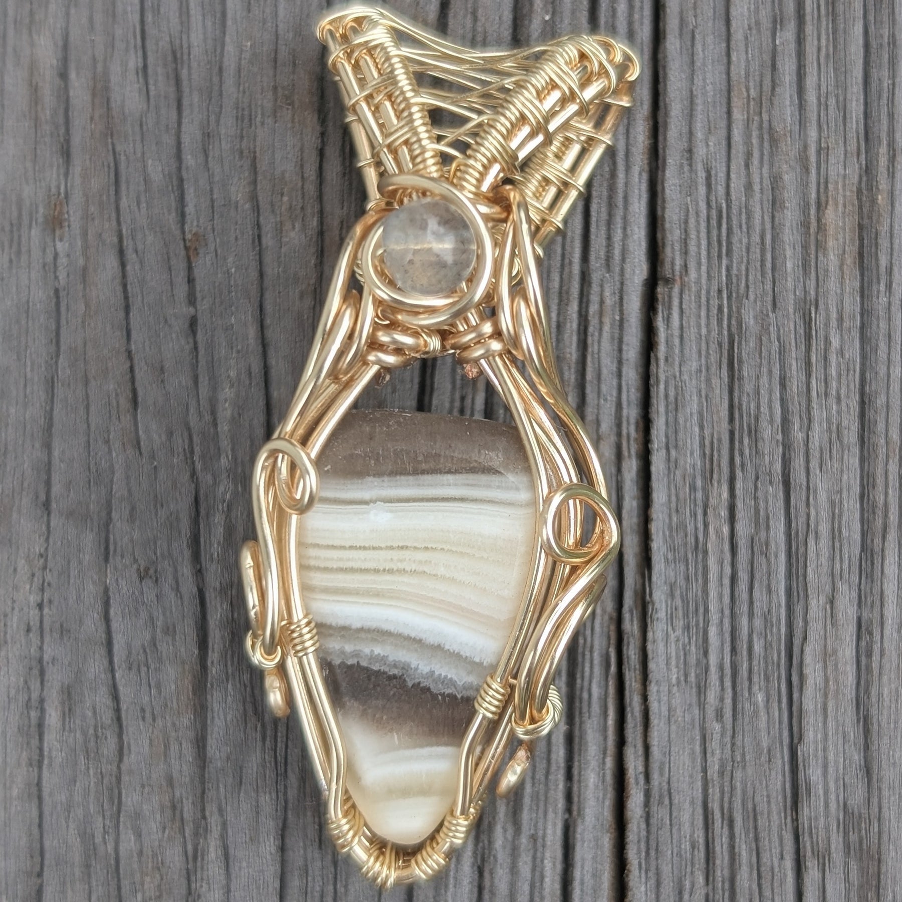 The Page - Zebra Calcite in Gold Coloured Copper