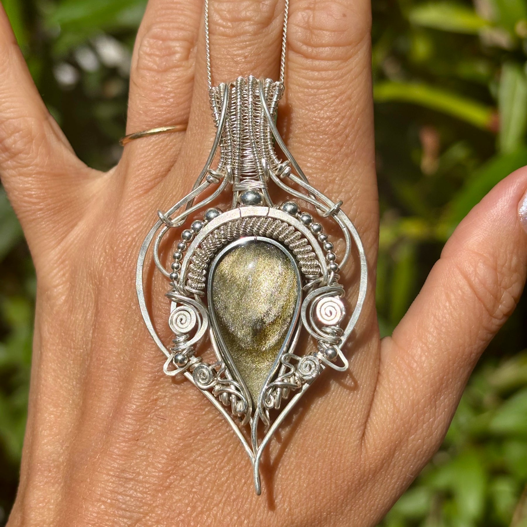 Golden sheen obsidian crystal pendant creation