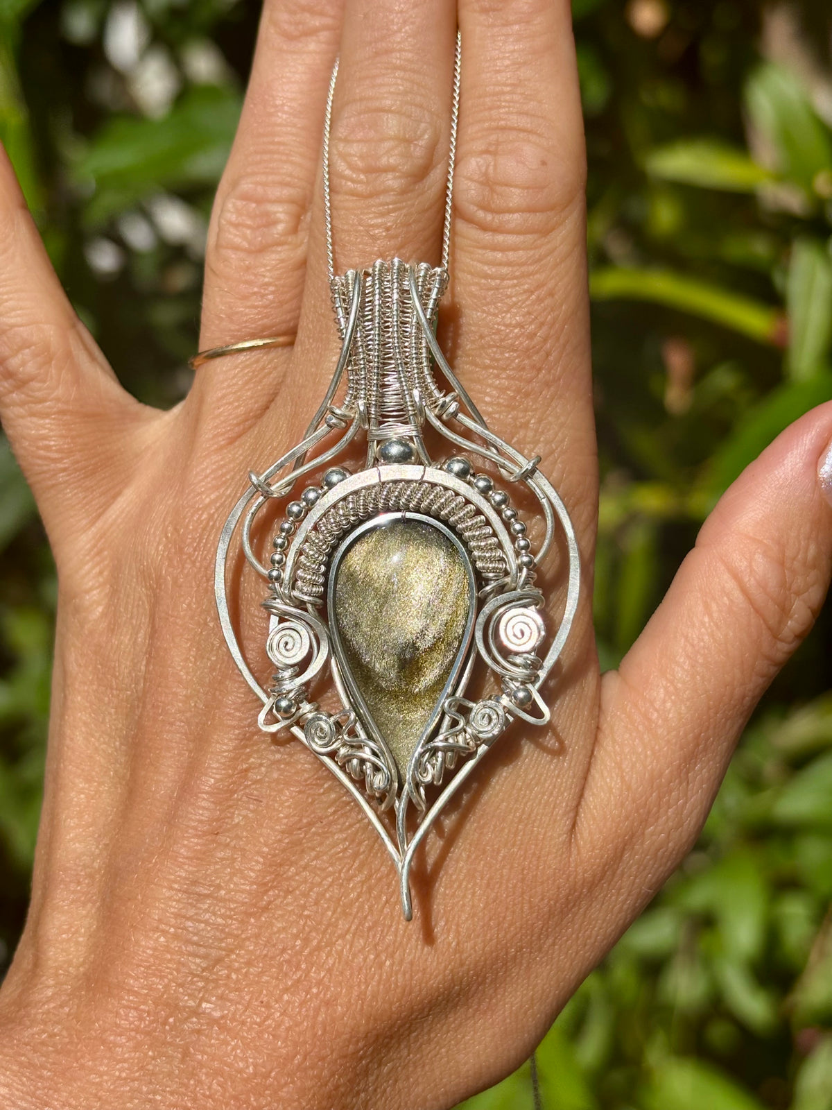 Golden sheen obsidian crystal pendant creation
