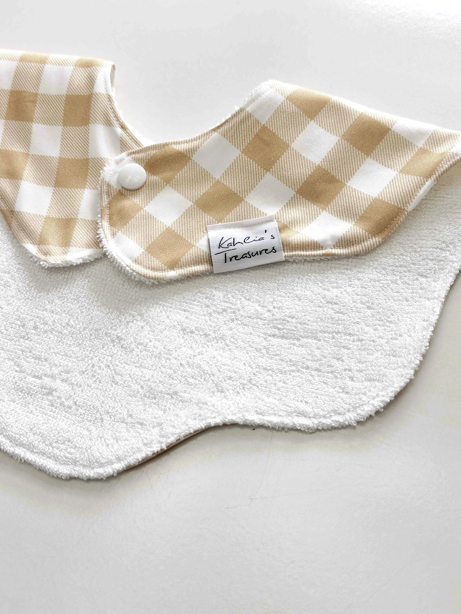 Beige gingham scalloped bib
