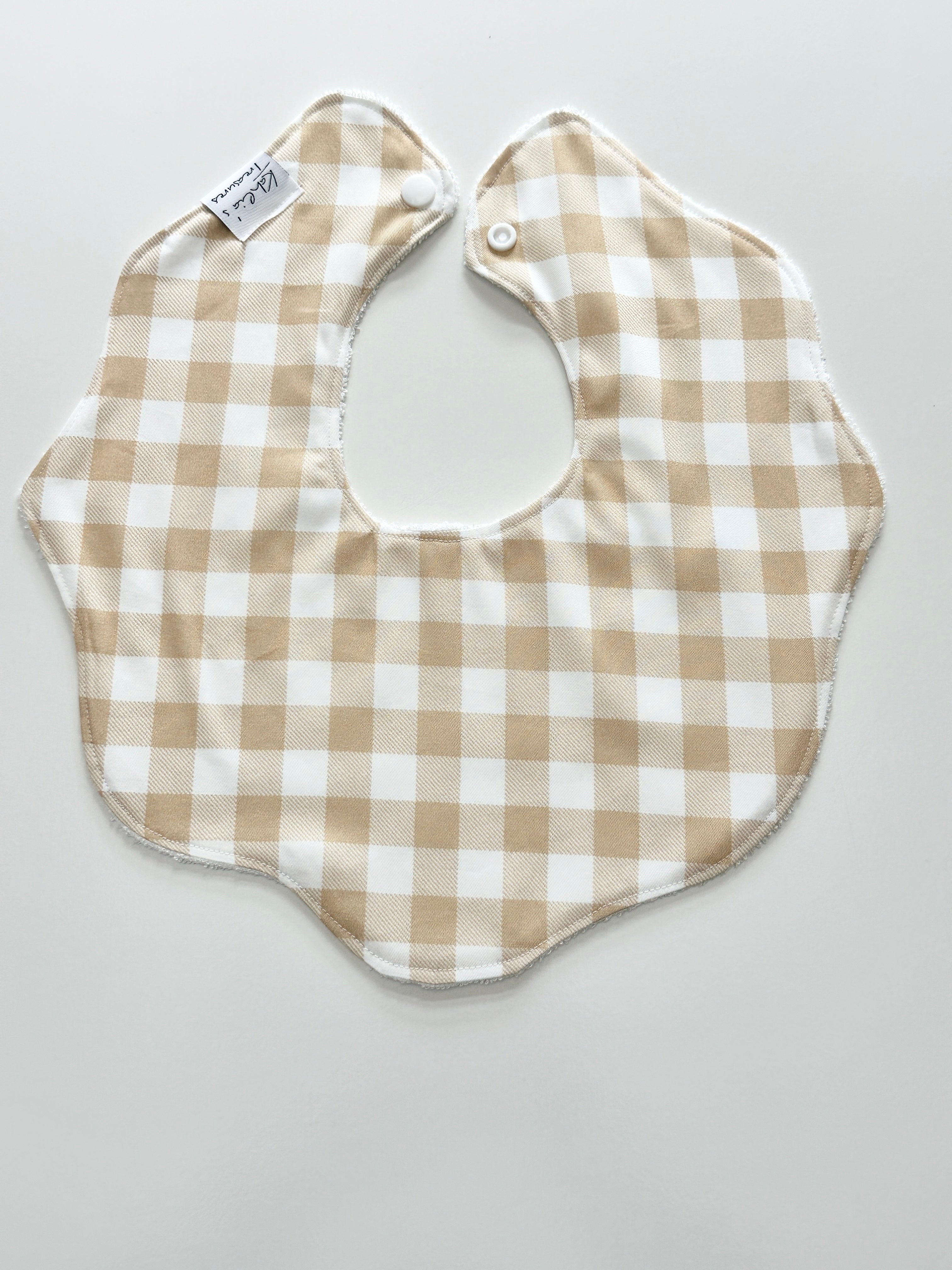 Beige gingham scalloped bib