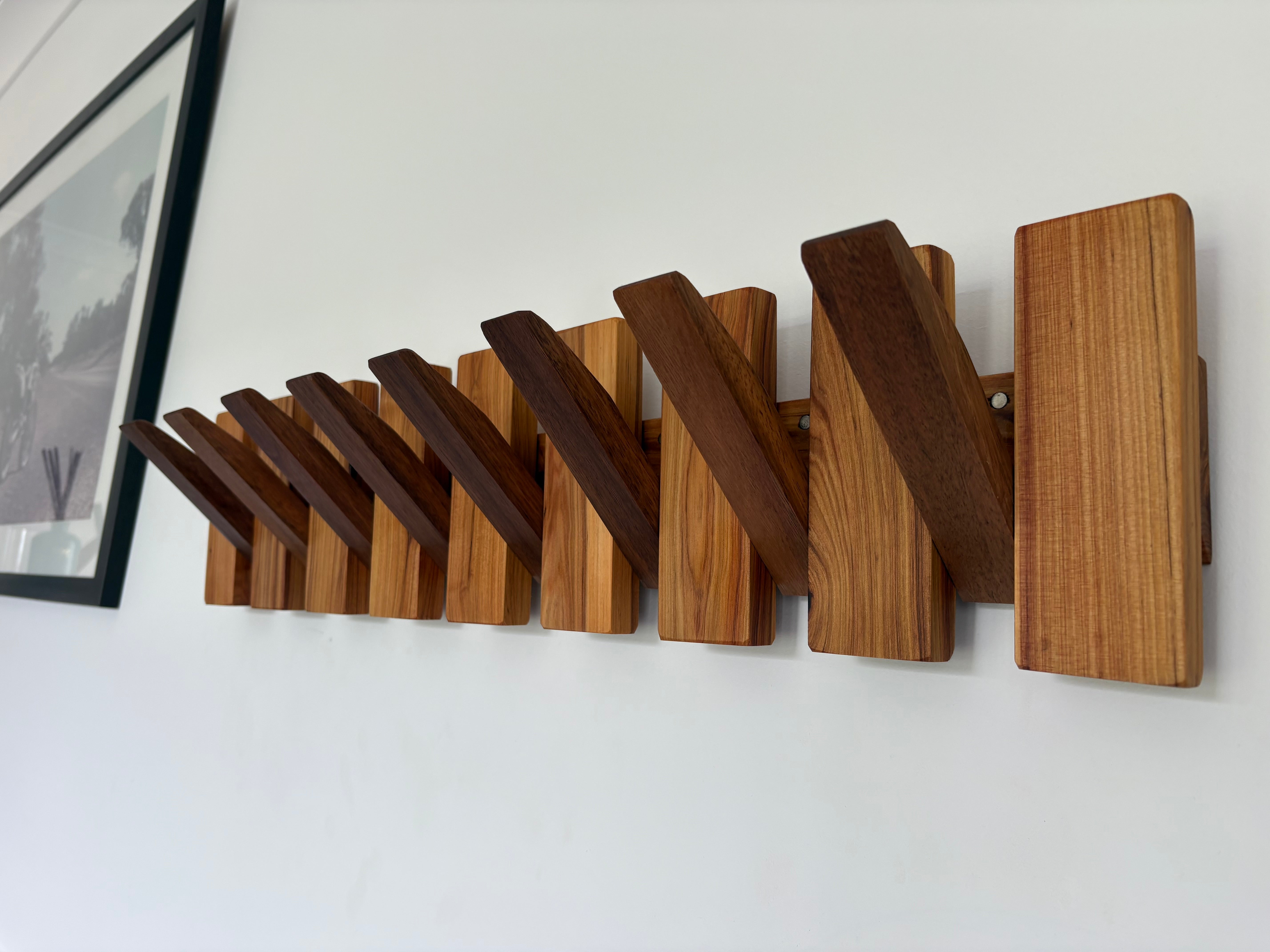Two tone piano style coatrack