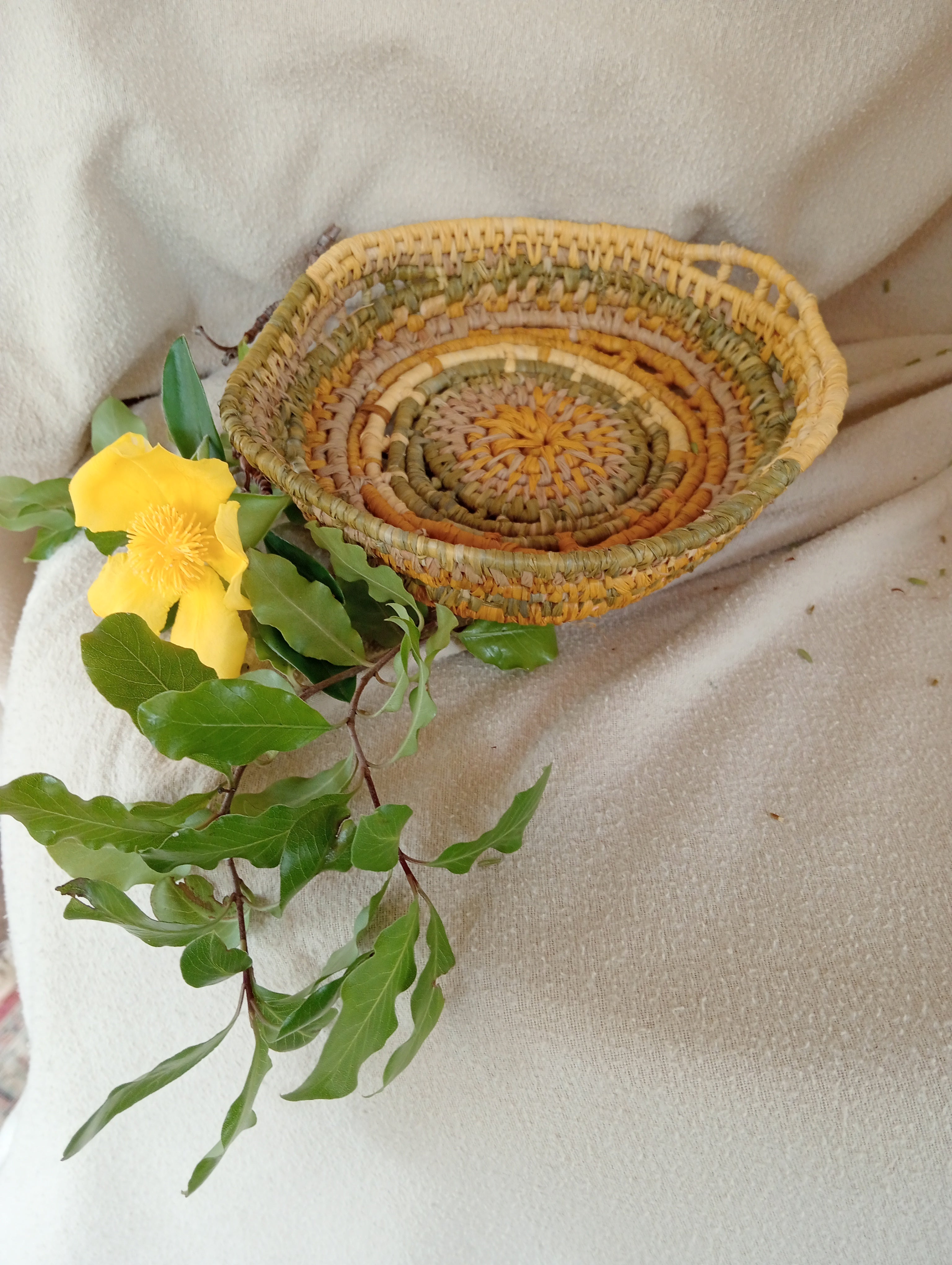 Small ornamental basket in saffron and green