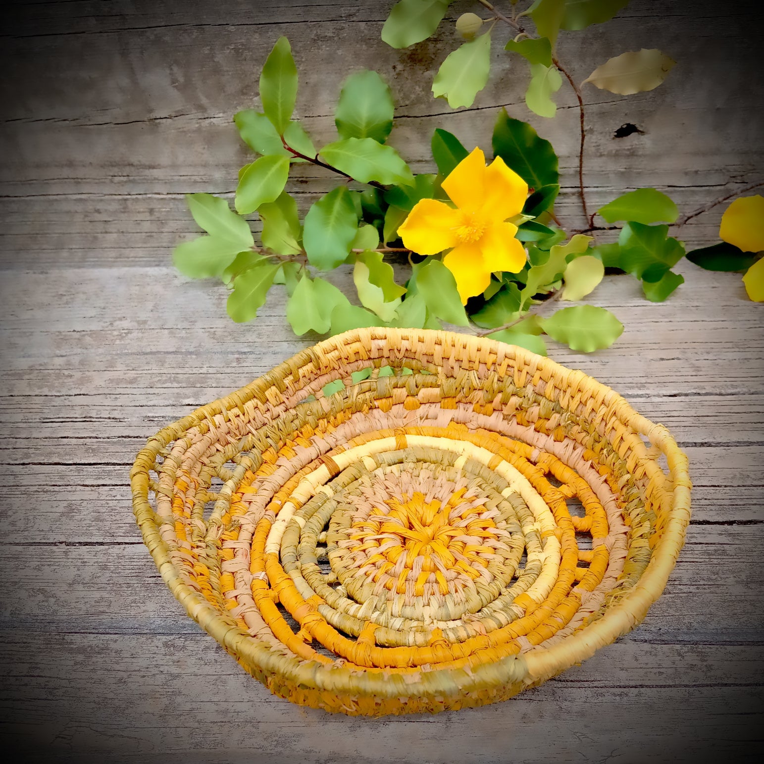 Small ornamental basket in saffron and green