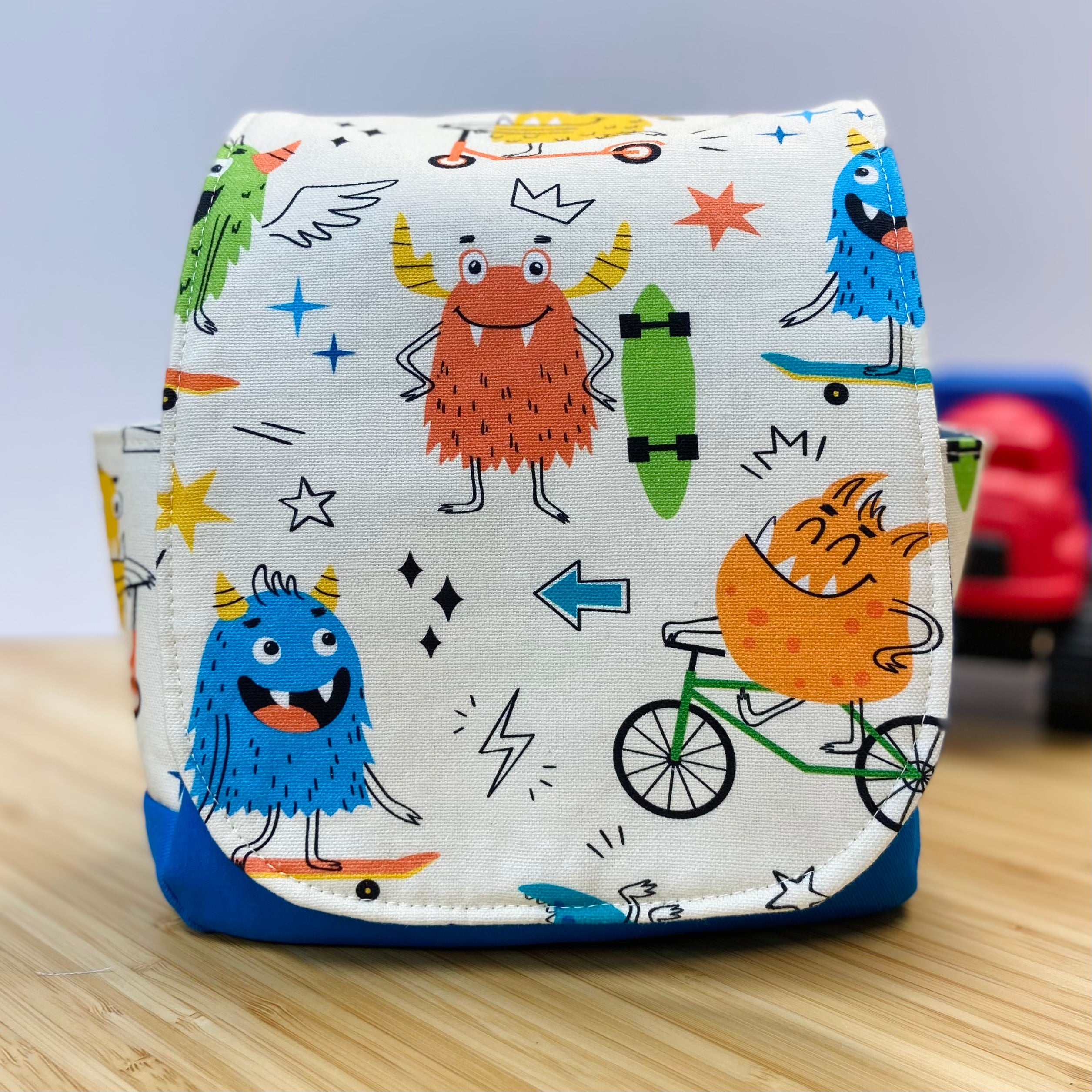 Handmade Children’s Mini Backpack - Monsters on Wheels
