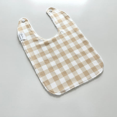 Beige gingham bib