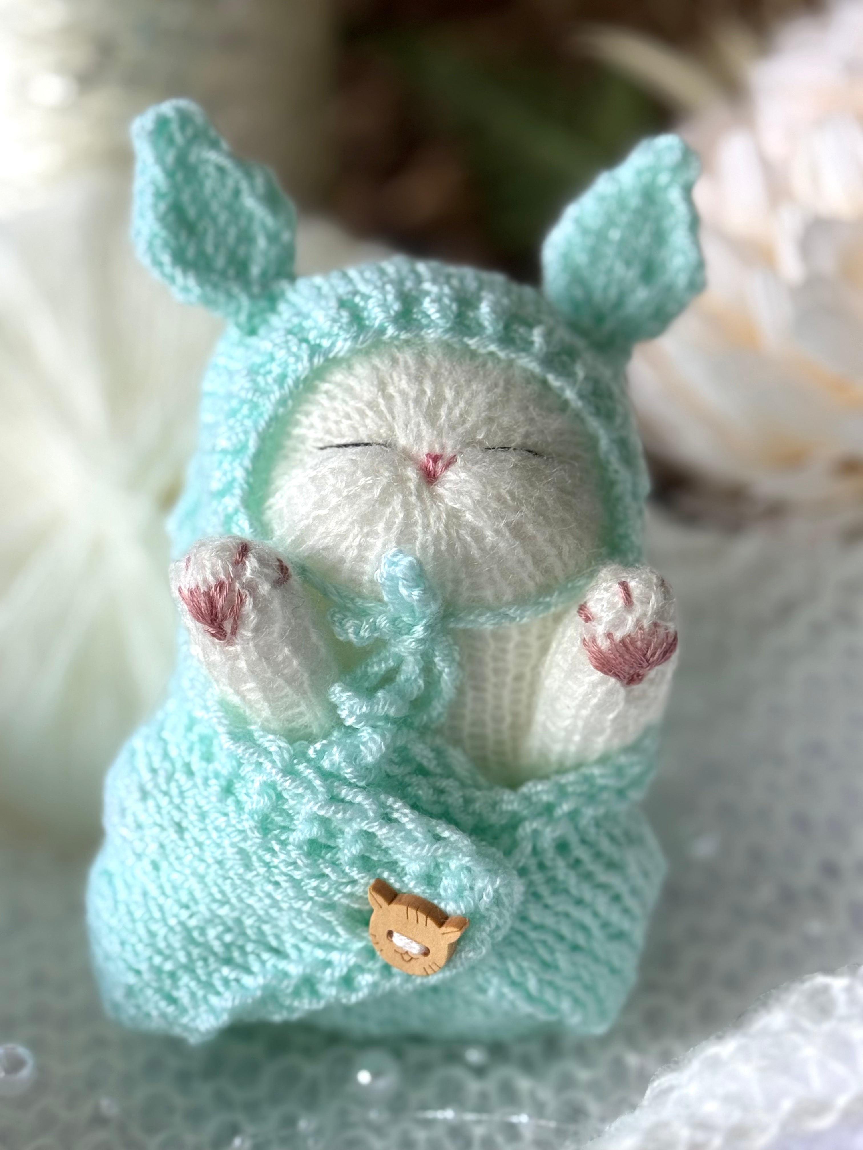 Handmade White Knitted Sleeping Kitty Toy in The Bunny Hat and Blanket