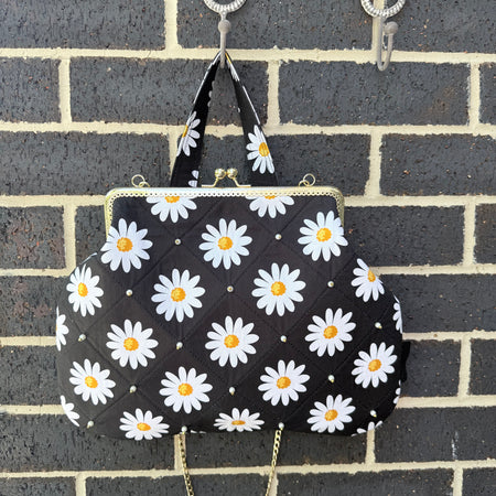 ‘Field of daisies’ metal frame purse