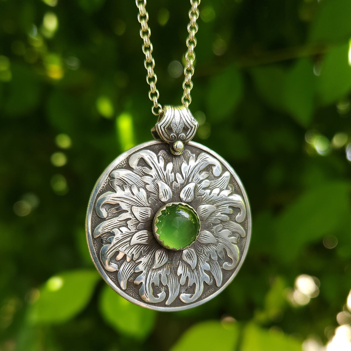Leafy medallion with serpentine