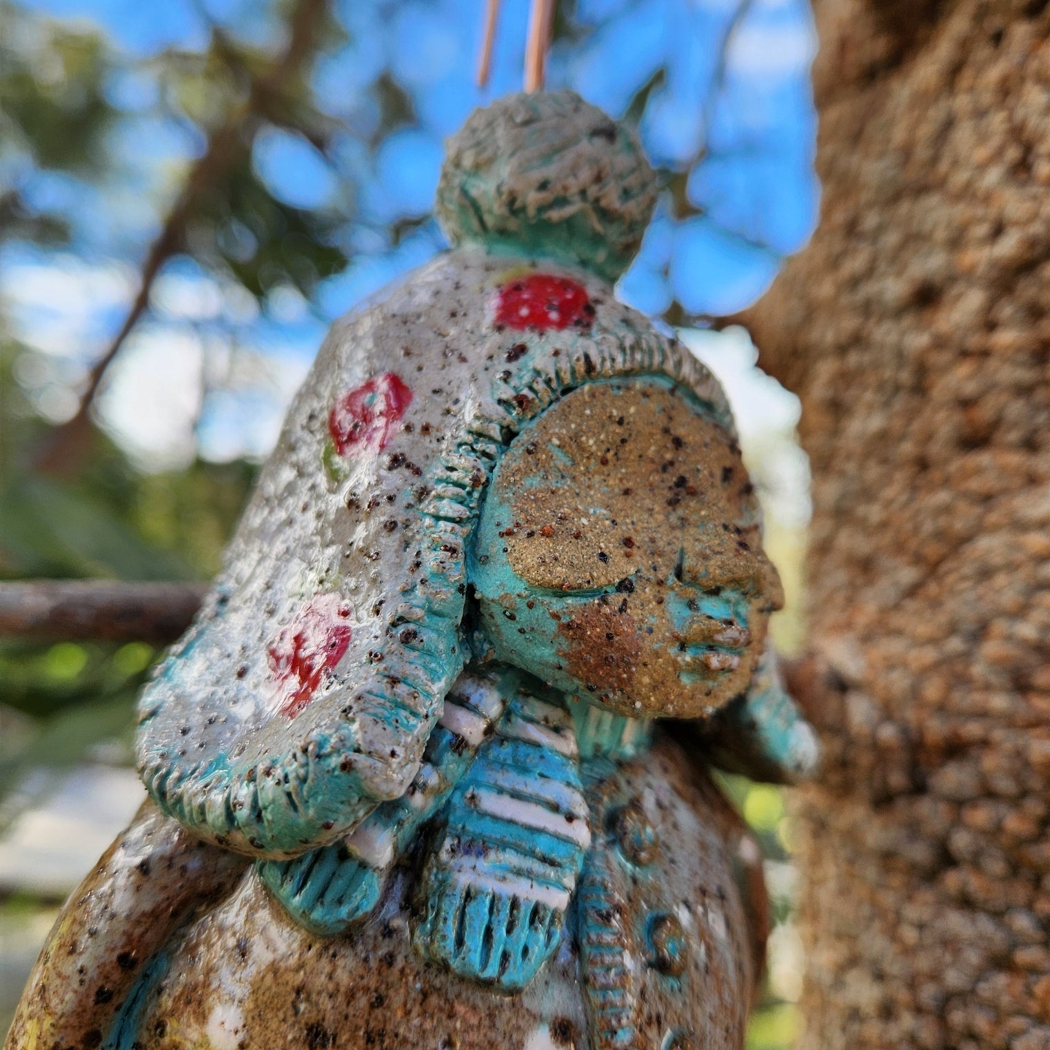 Clay windchime, little girl,