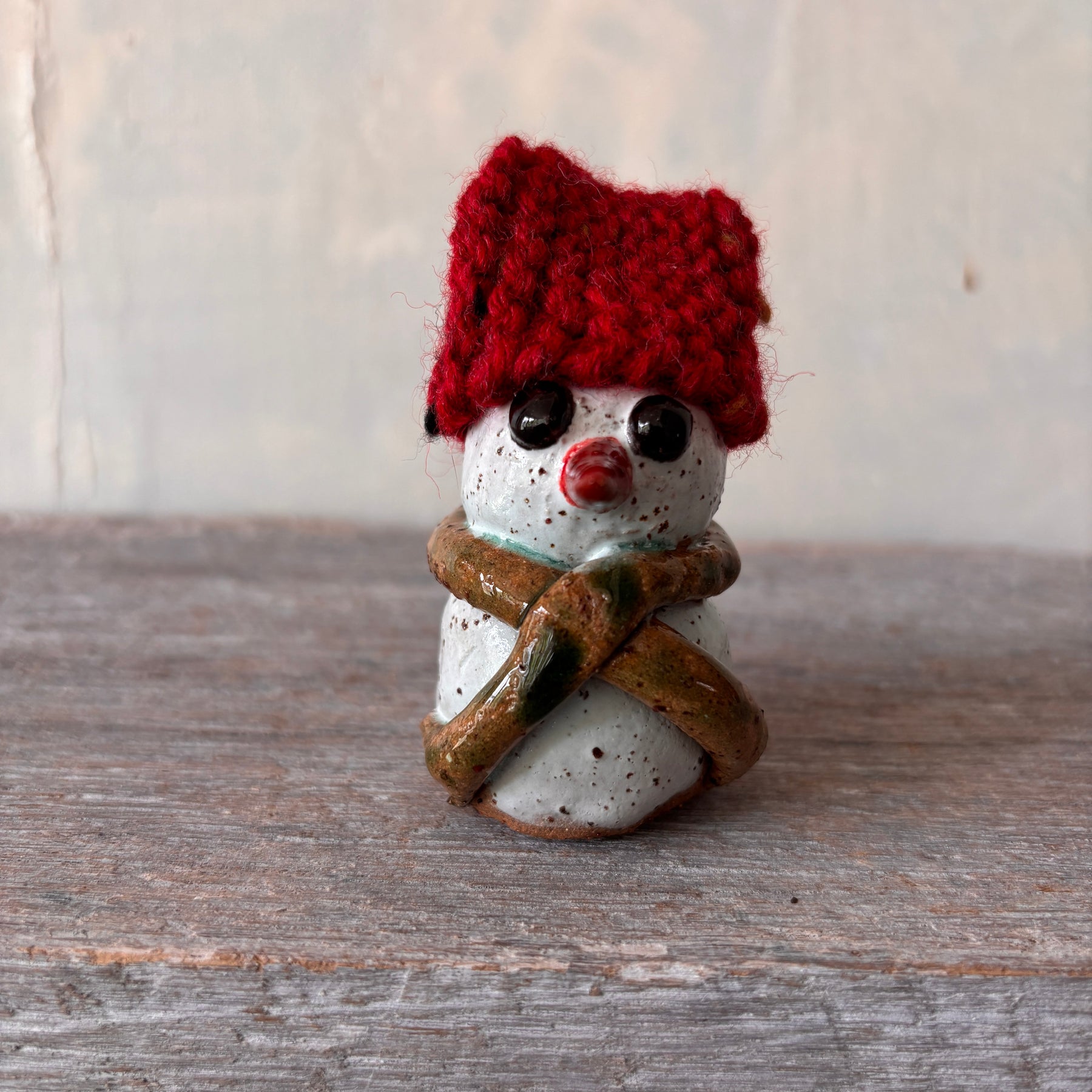 Ceramic Snowman with red hand-knitted hat (26-12)