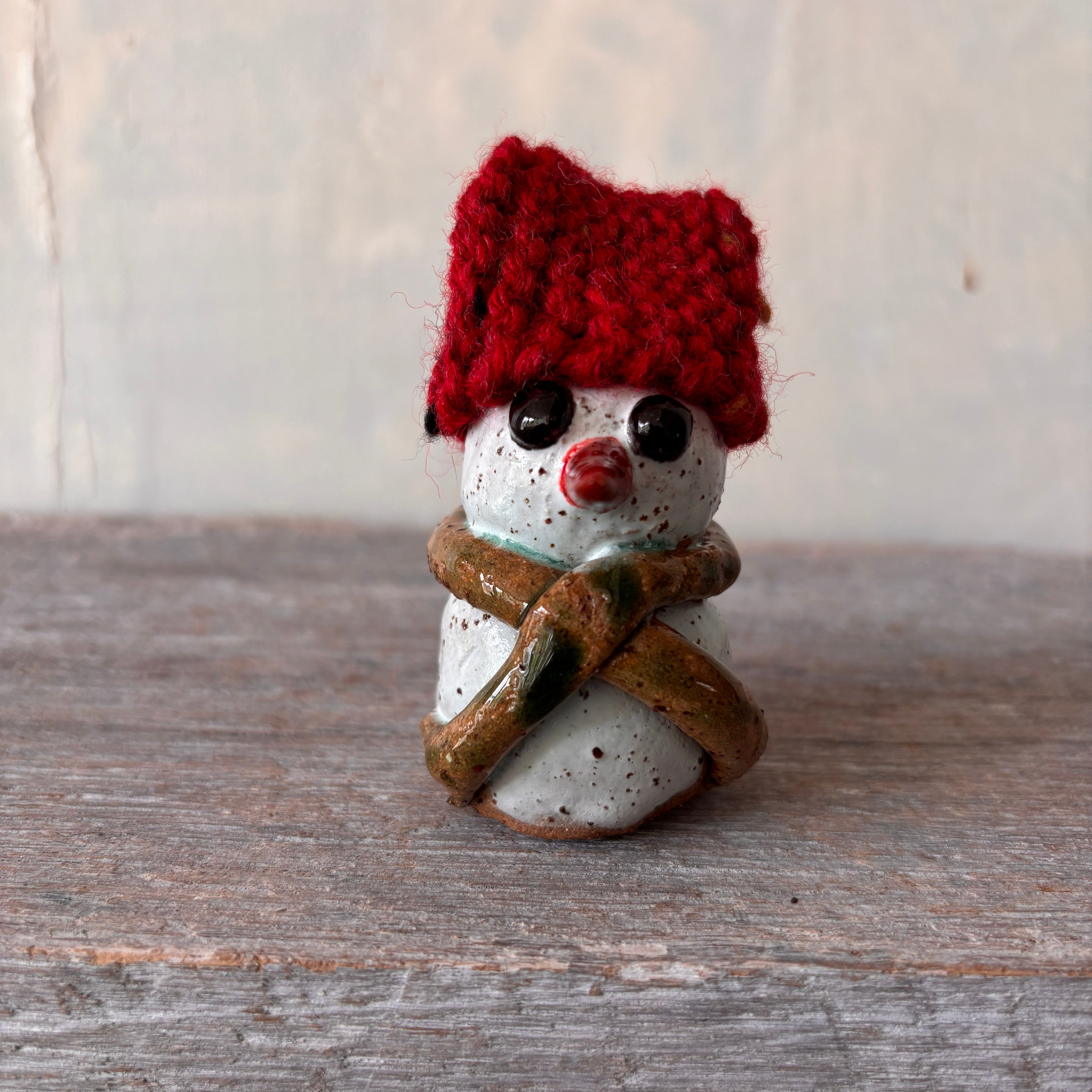 Ceramic Snowman with red hand-knitted hat (26-12)