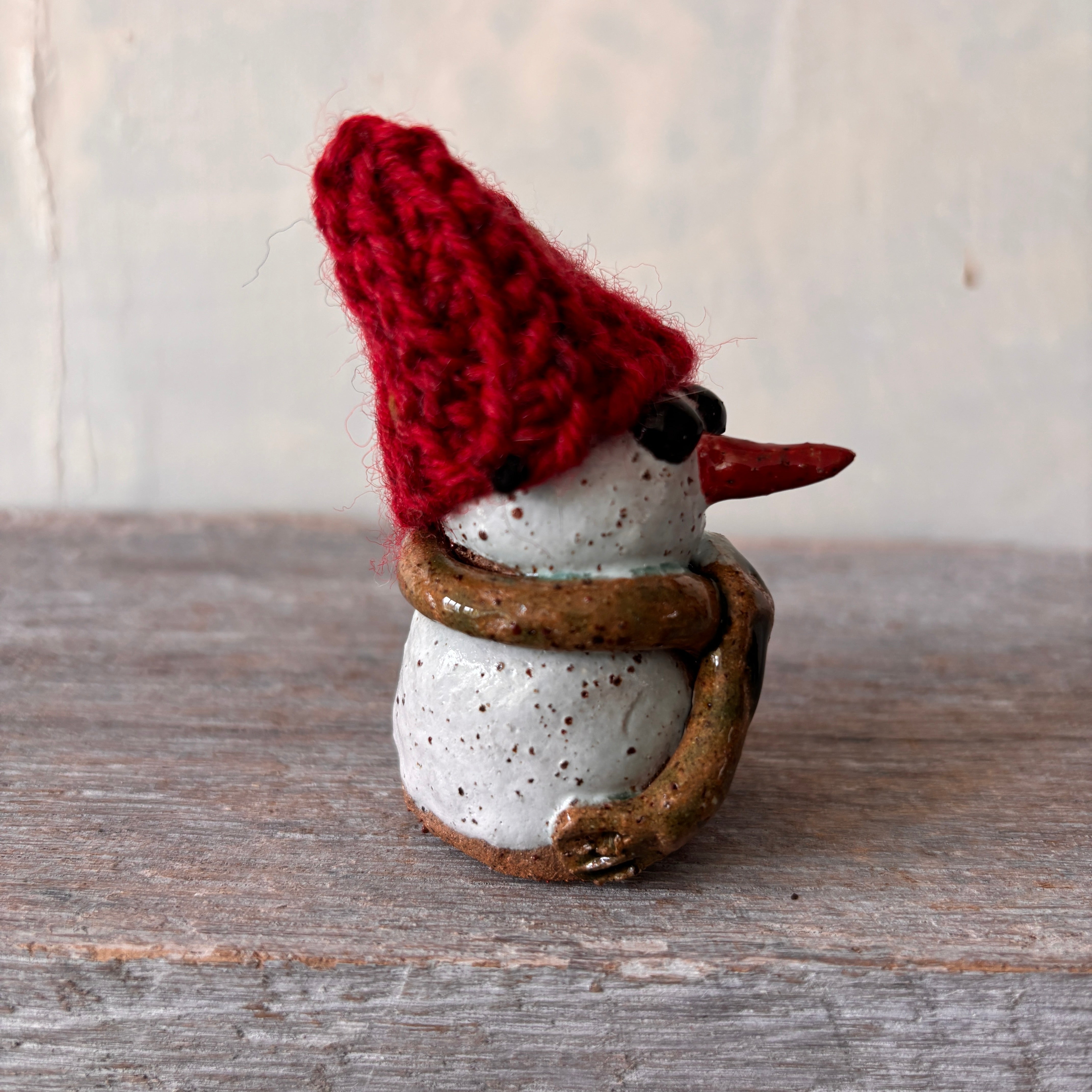 Ceramic Snowman with red hand-knitted hat (26-12)