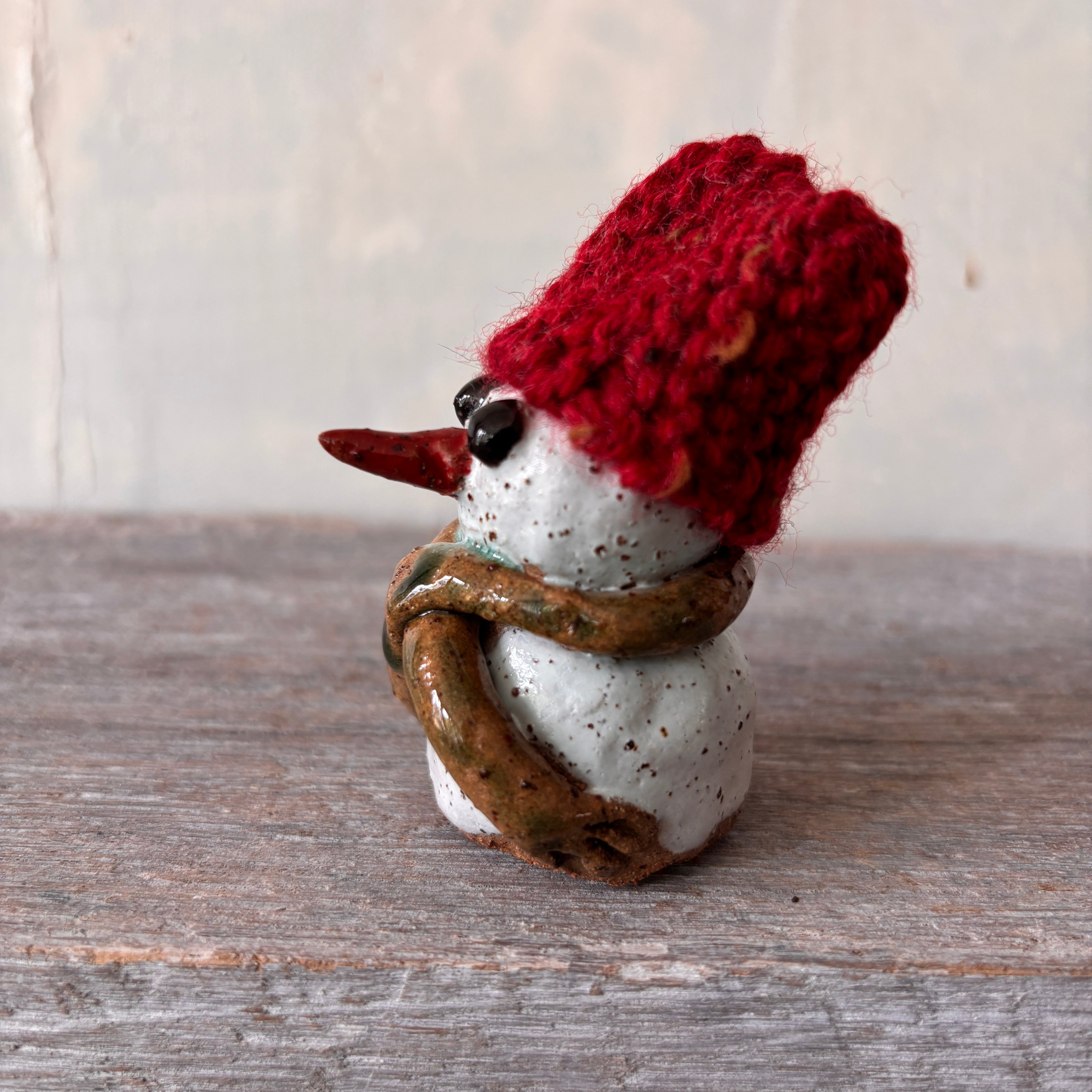 Ceramic Snowman with red hand-knitted hat (26-12)