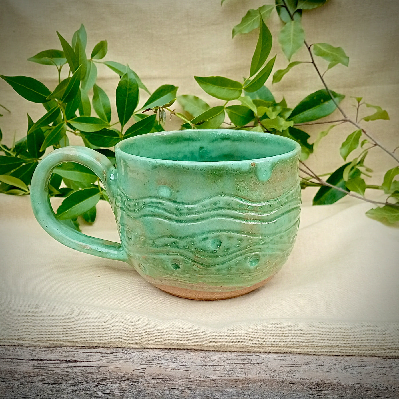 Light jade green hand made mug